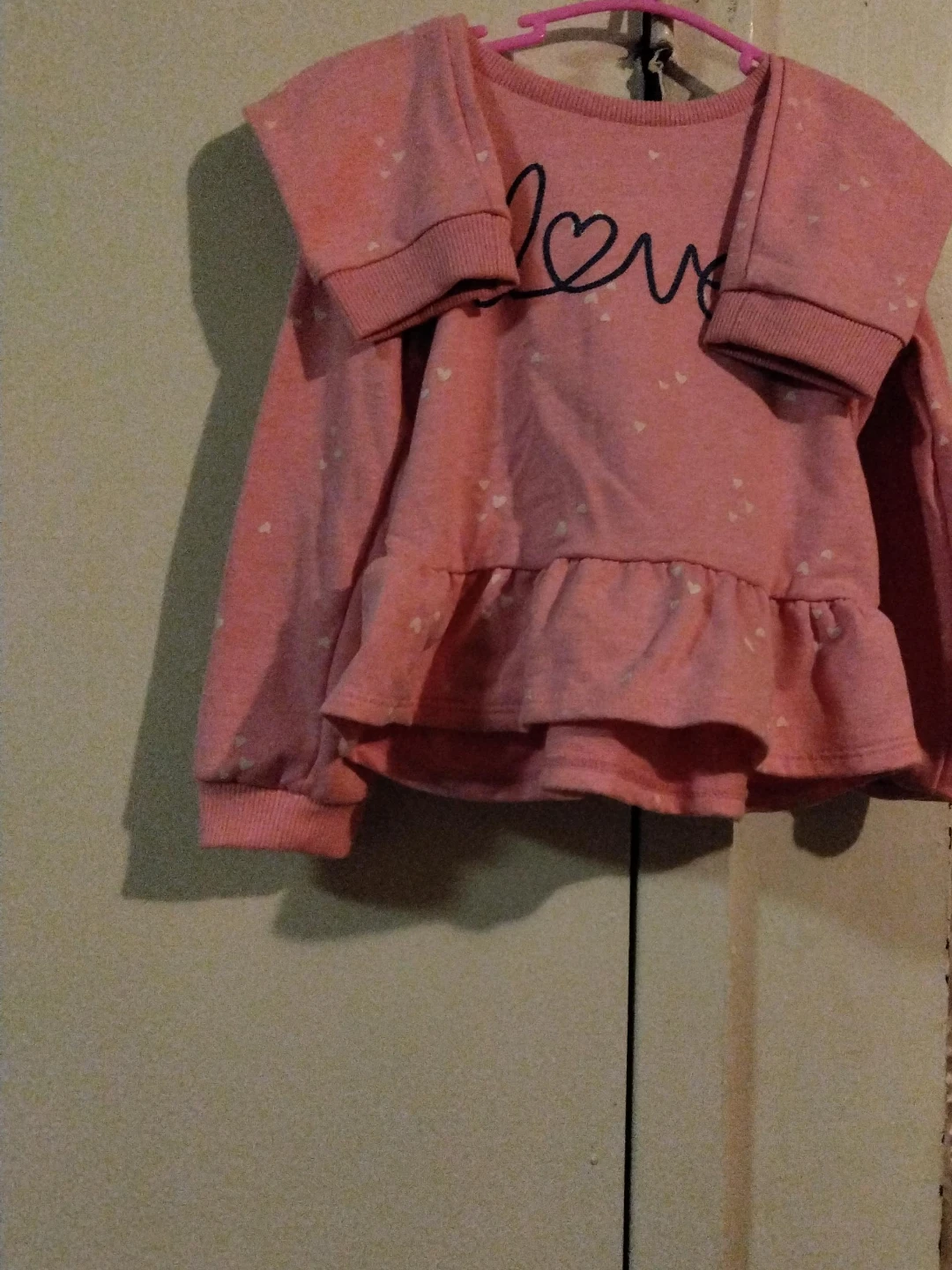Pink "Love" Peplum Long Sleeve Top