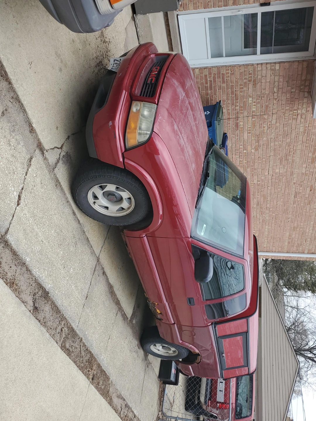 Red GMC Sonoma Pickup Truck