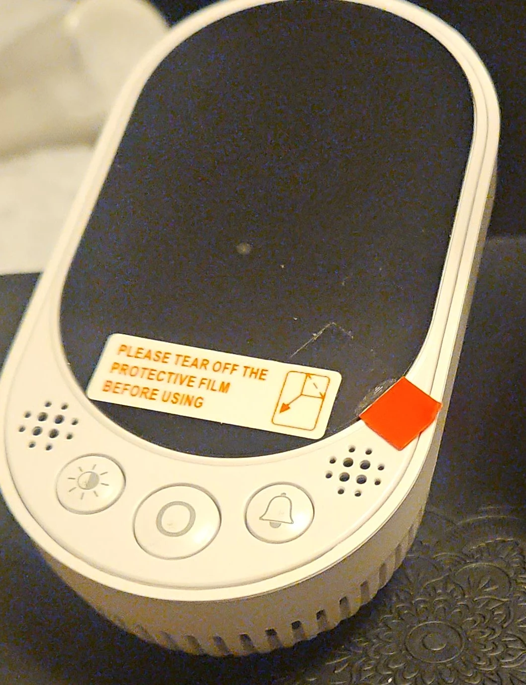 White Smart Device with Light and Alarm Buttons