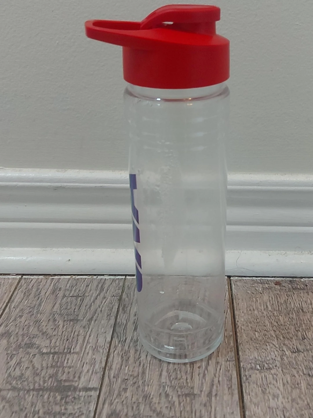 Clear Plastic Water Bottle with Red Lid