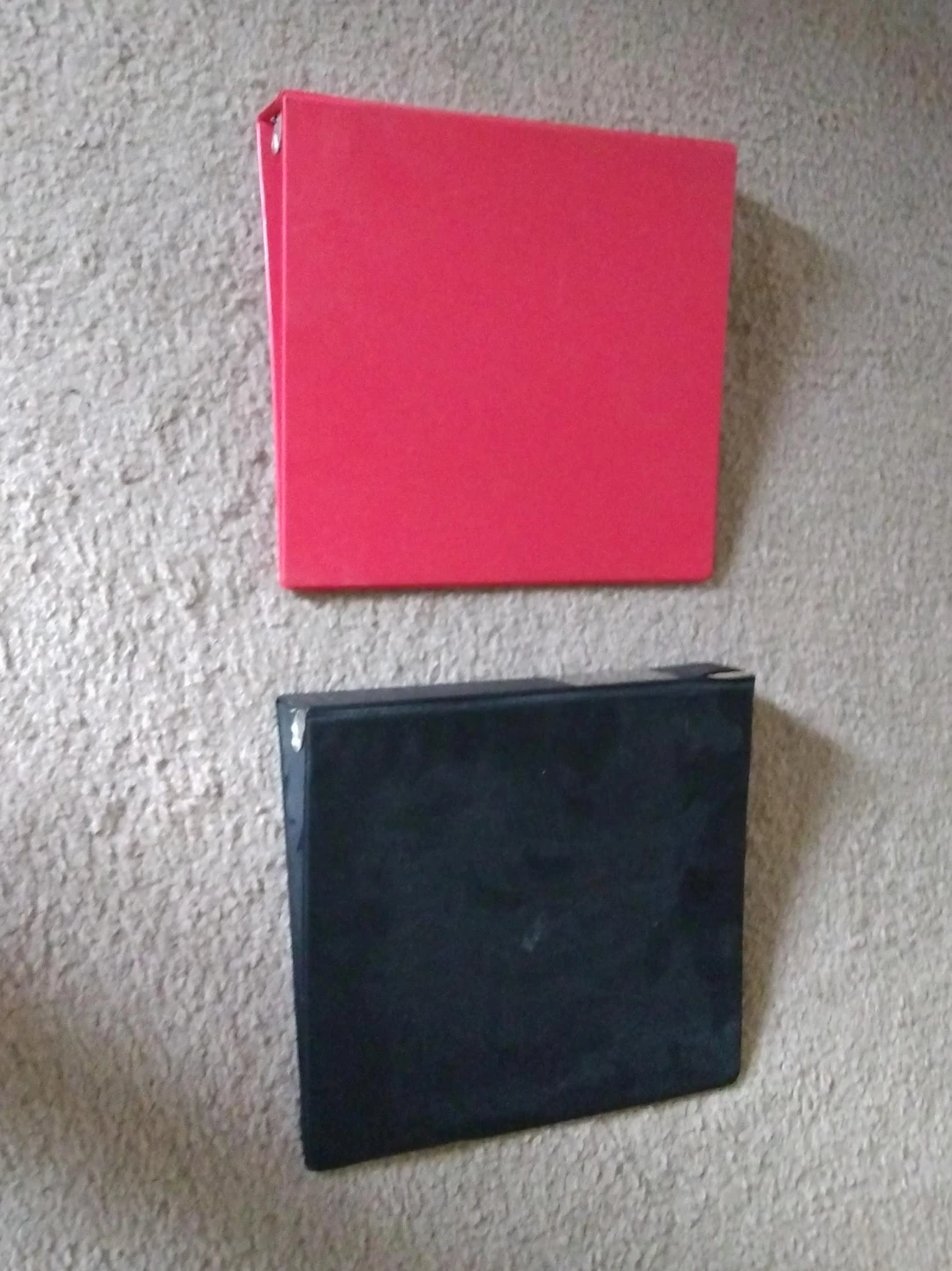 Two binders - red and black