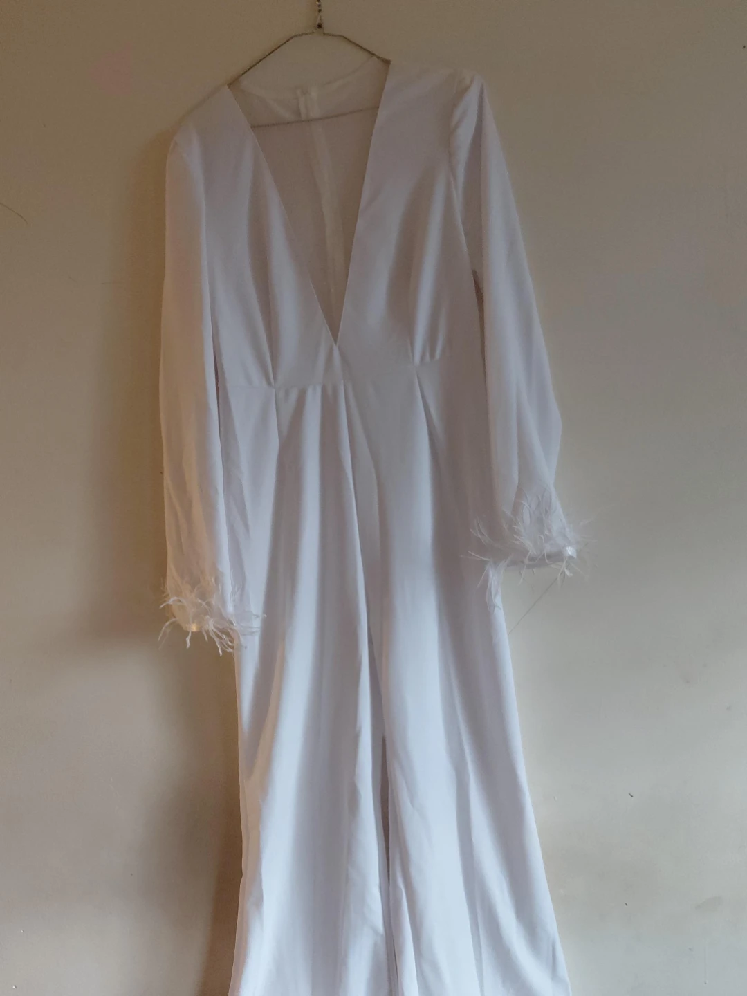 White Jumpsuit with Feather Cuffs