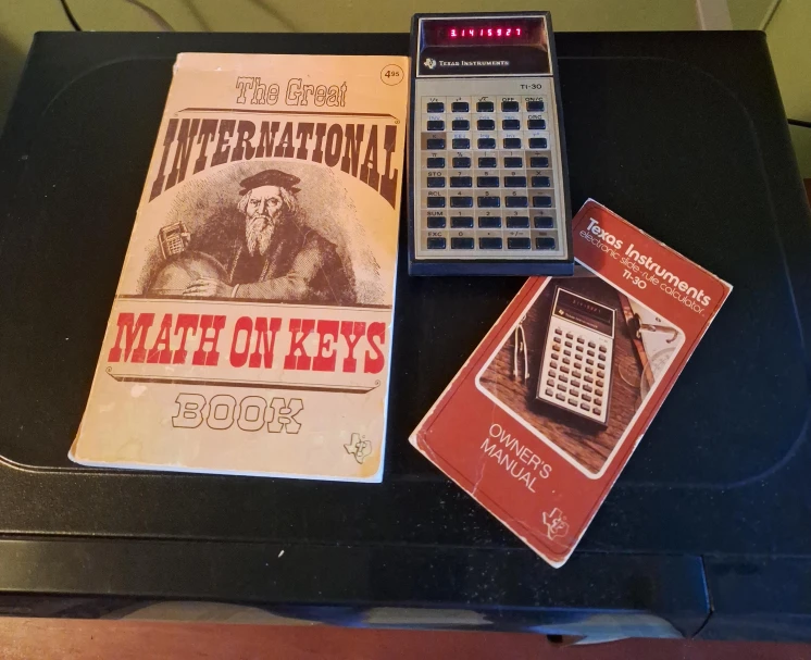 Texas Instruments TI-30 Calculator w/Book