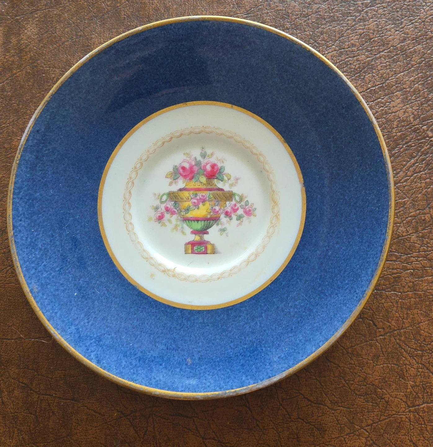 Decorative Plate with Floral Urn Design