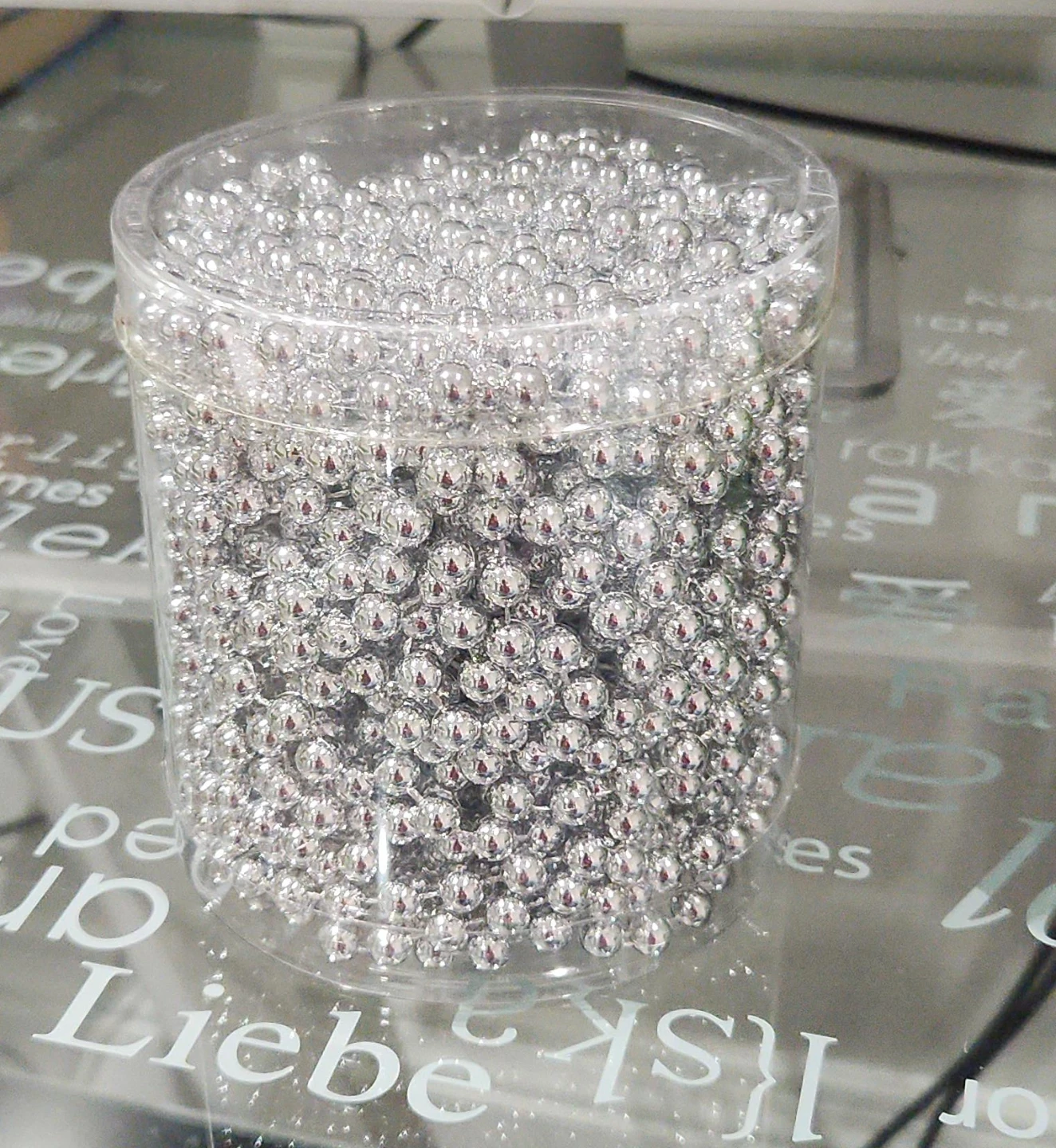 Silver Decorative Beads in Jar