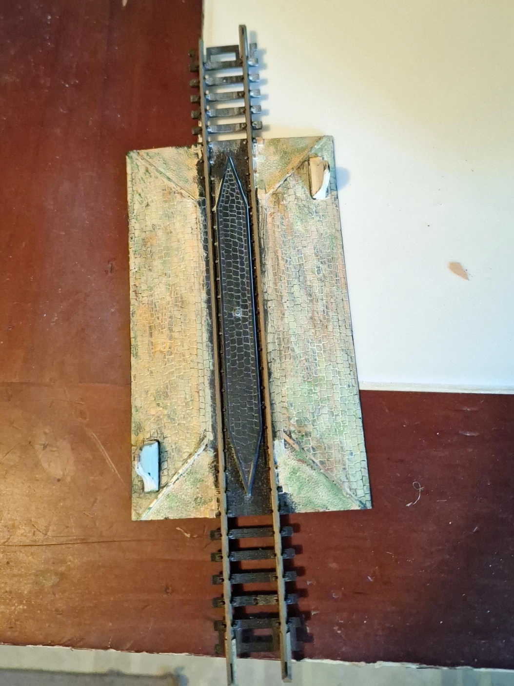 Model Train Track Section with Cobblestone Platform