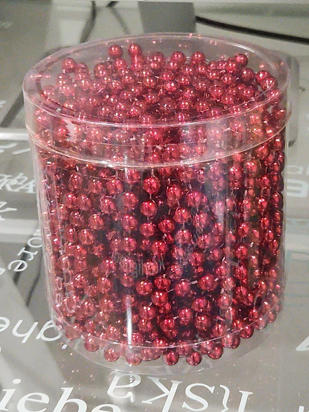 Red Beaded Garland in Clear Container