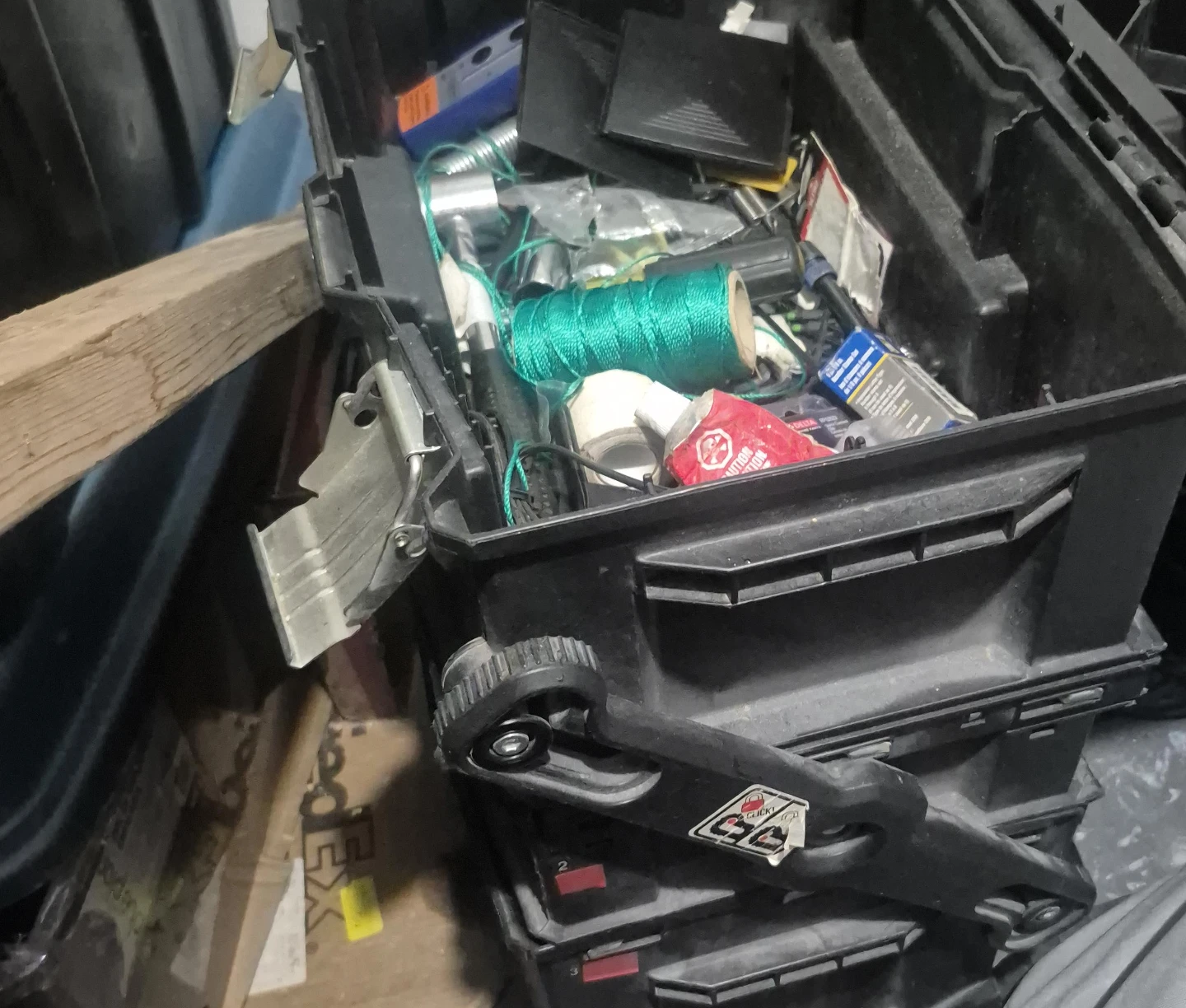 Black Plastic Toolbox with Assorted Hardware