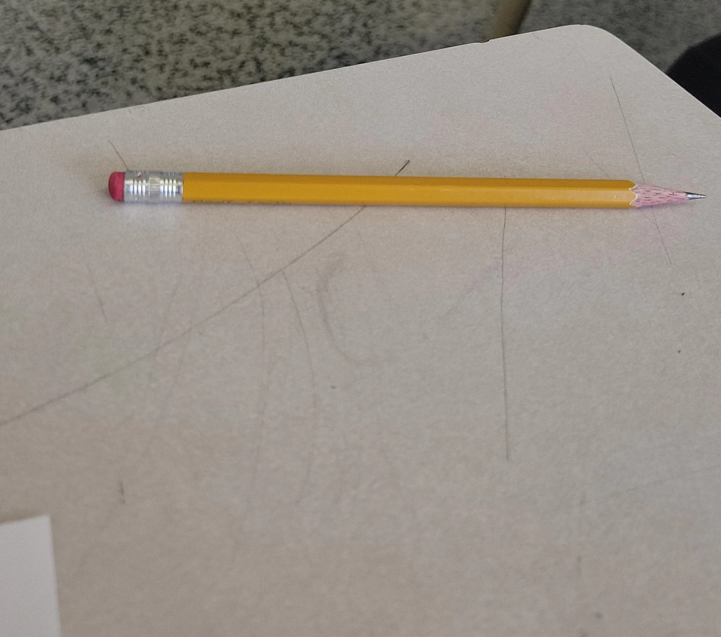Yellow wooden pencil with pink eraser and tip
