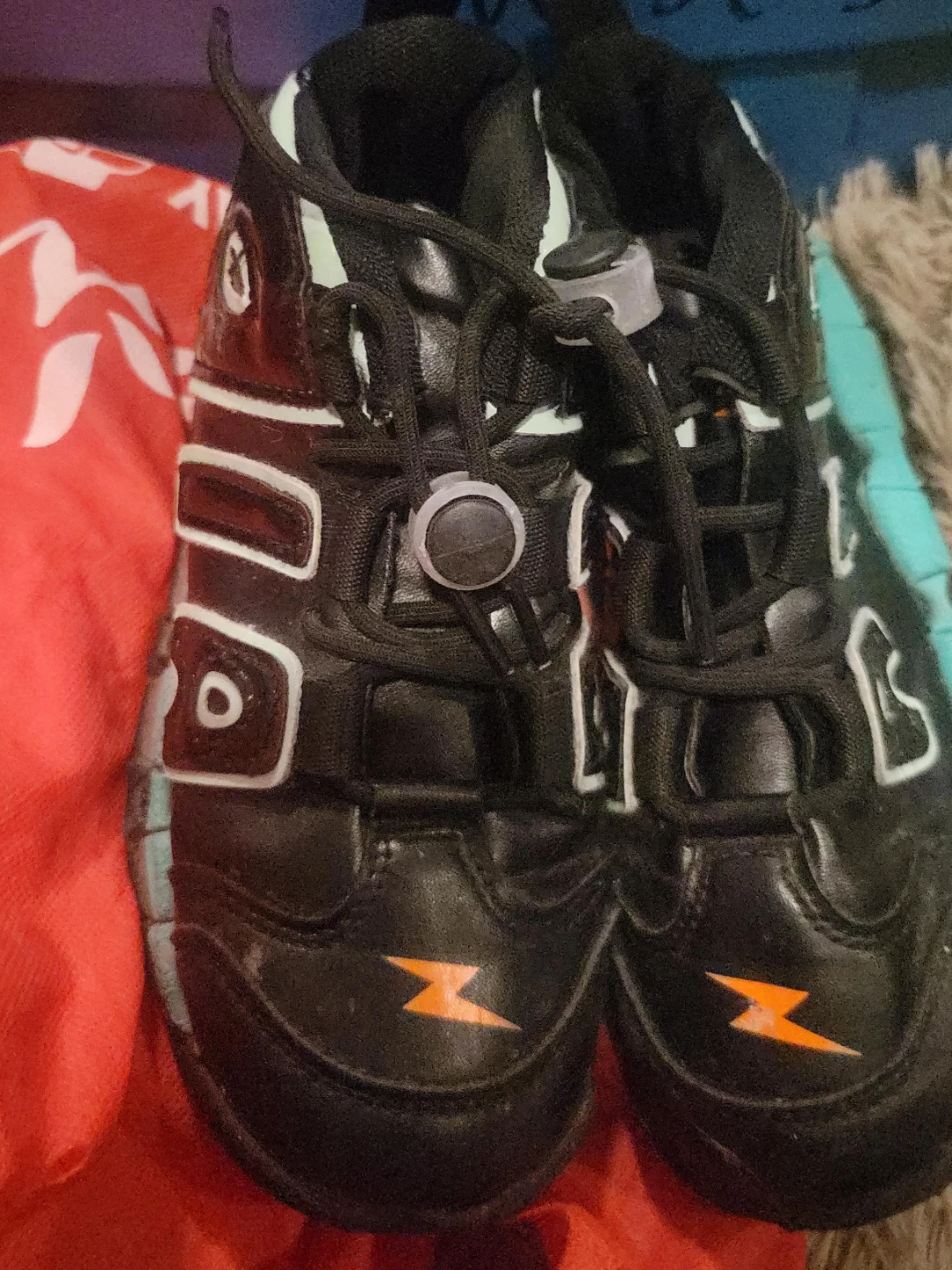 Black Kids Running Shoes with Orange Lightning Bolt