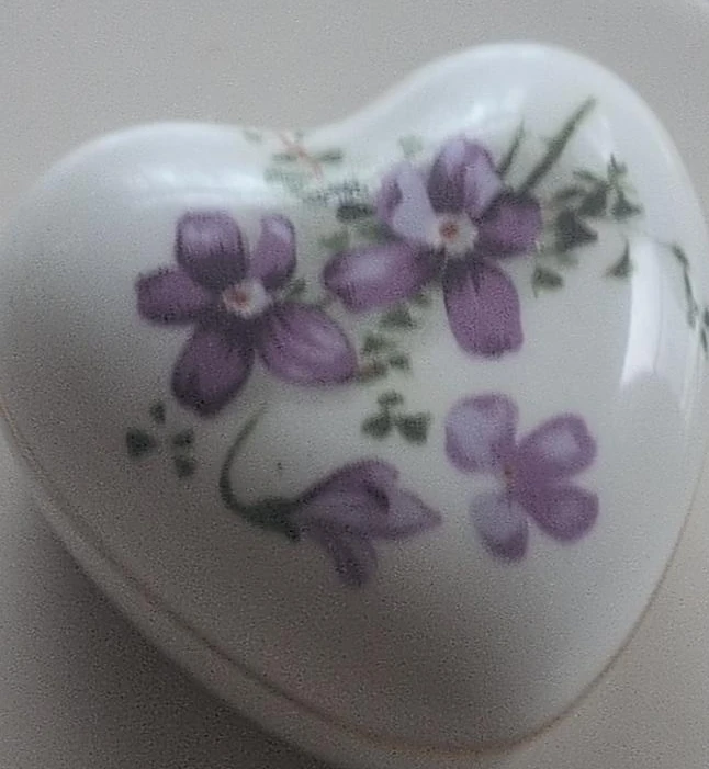 Heart-shaped trinket box with floral design