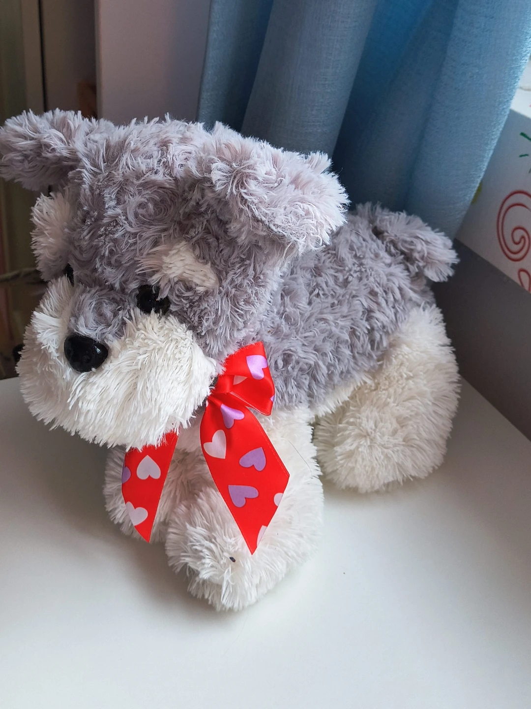 Plush Schnauzer Dog with Heart Bow
