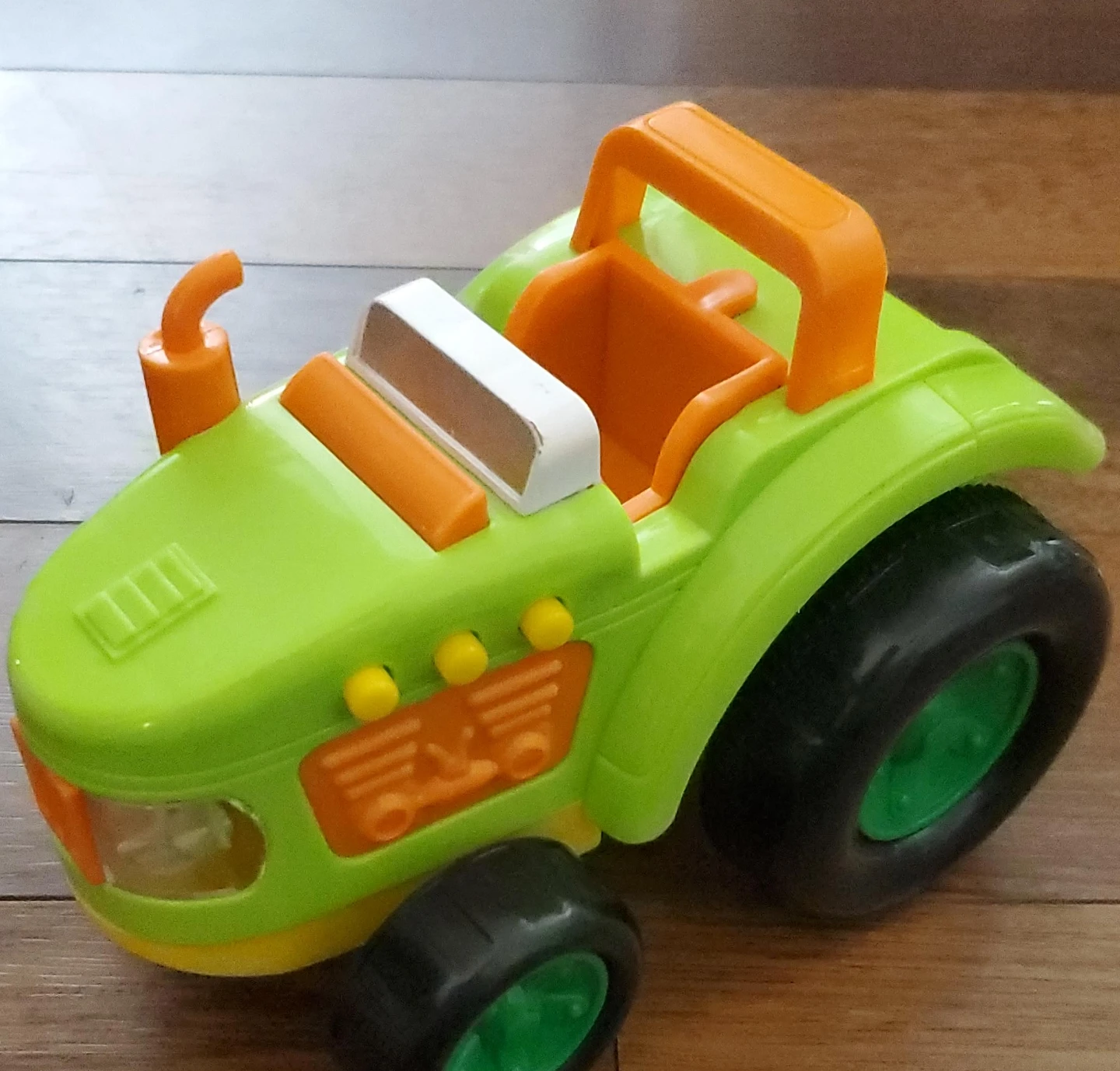 Green and Orange Toy Tractor with Lights