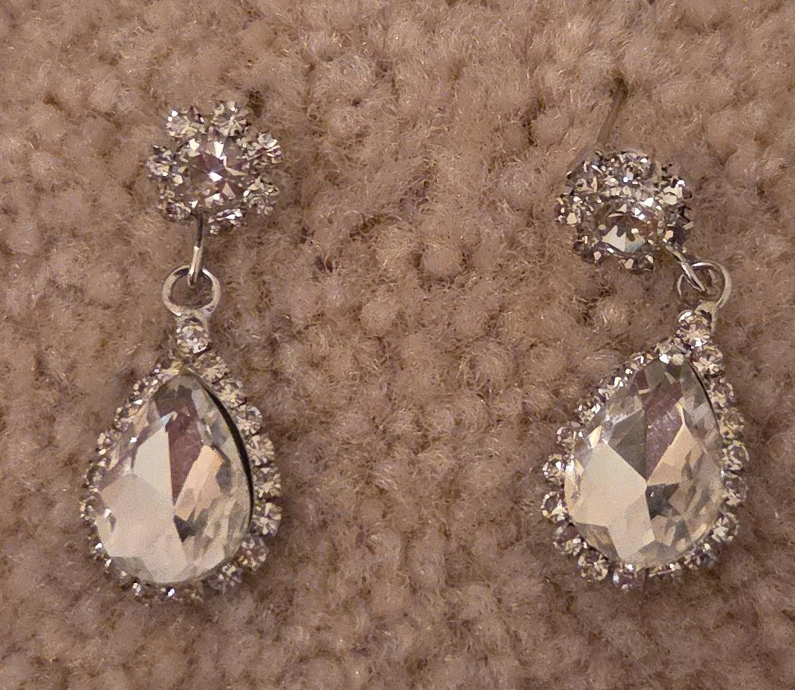 Clear teardrop dangle earrings with sparkly accents