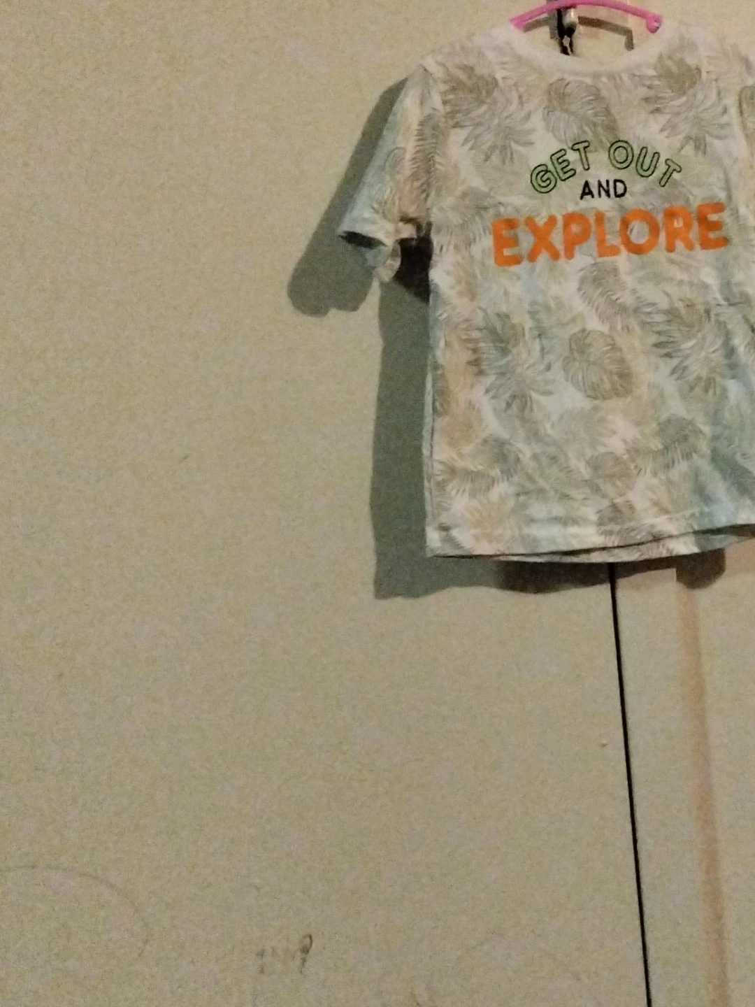 T-Shirt with "Get Out and Explore" Graphic