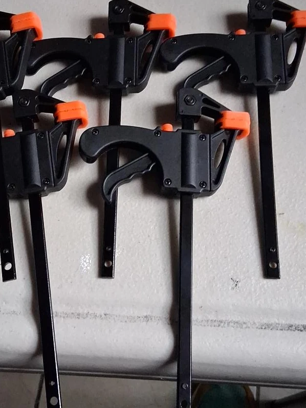 4 Black F-Clamps with Orange Accents