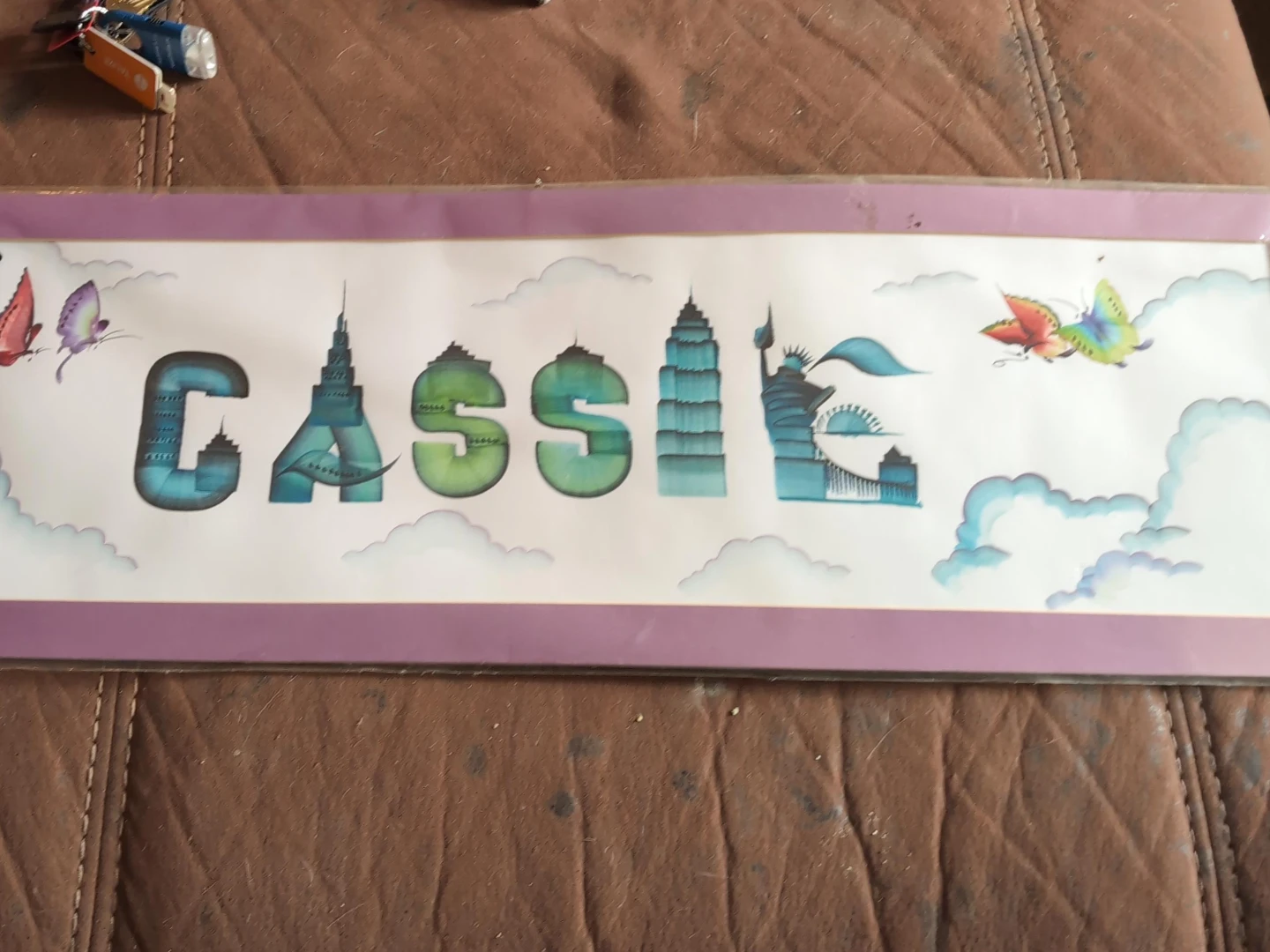 Cassie Name Art Print with Cityscape and Butterflies