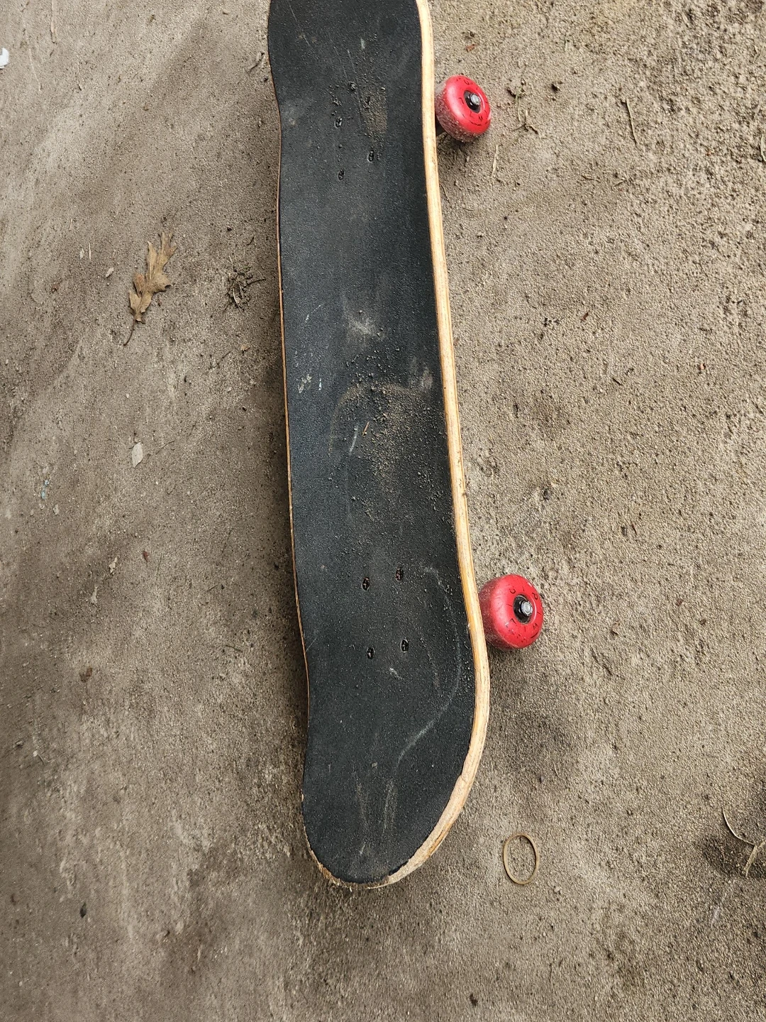 Red Skateboard with 'JR' graphic