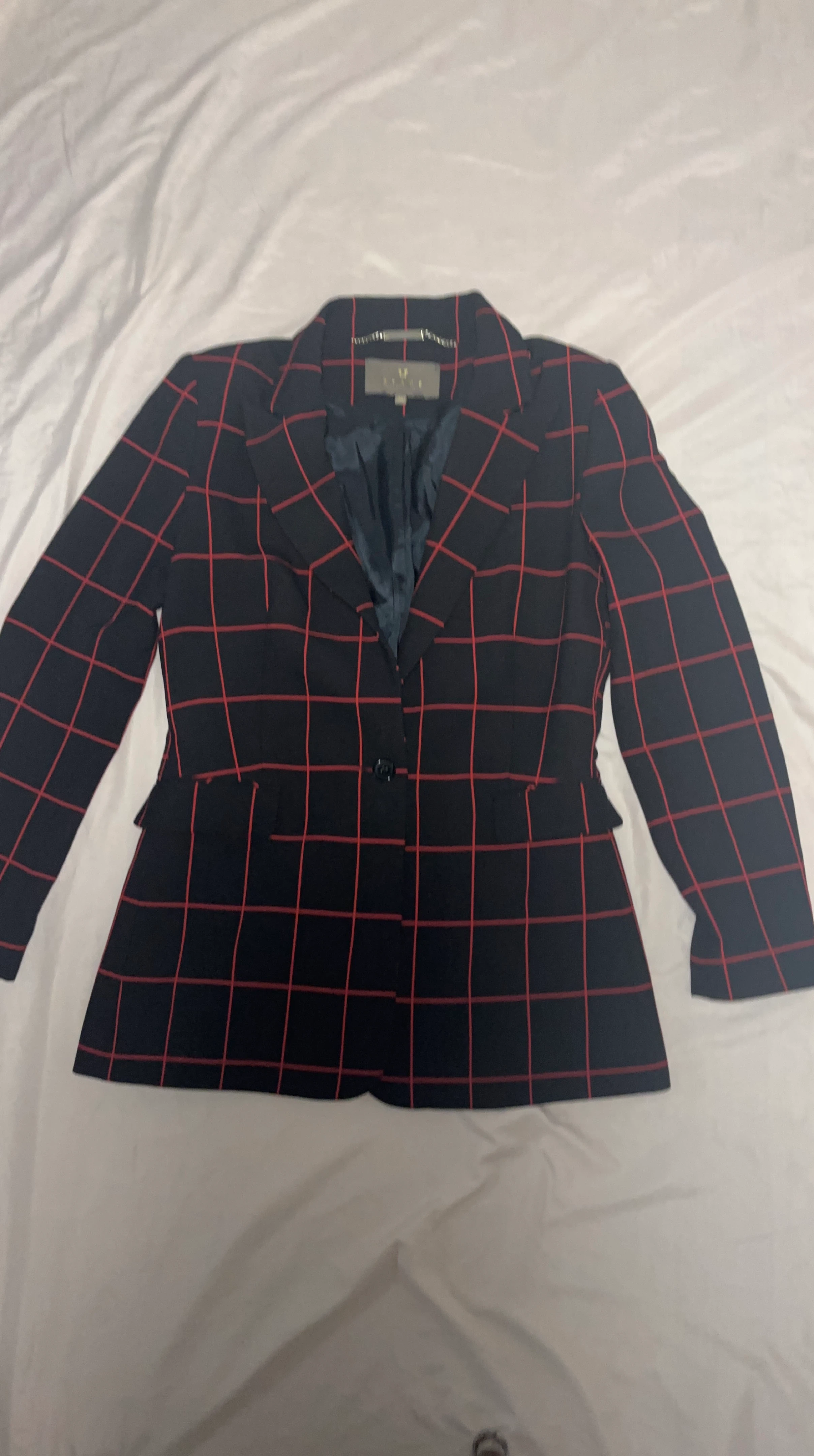 Blazer with red plaid pattern