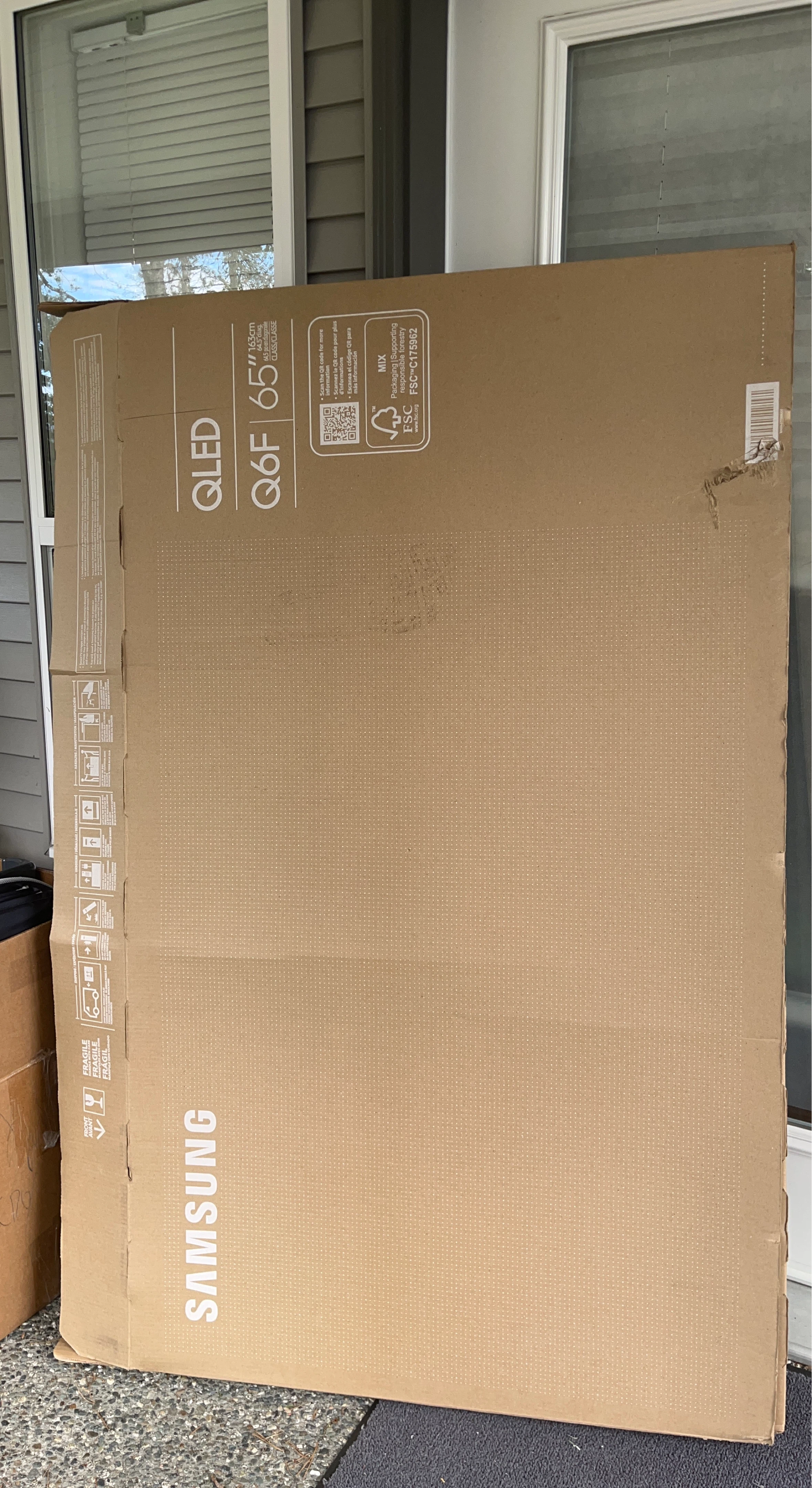 Box of Samsung 65" QLED Q6F Smart TV