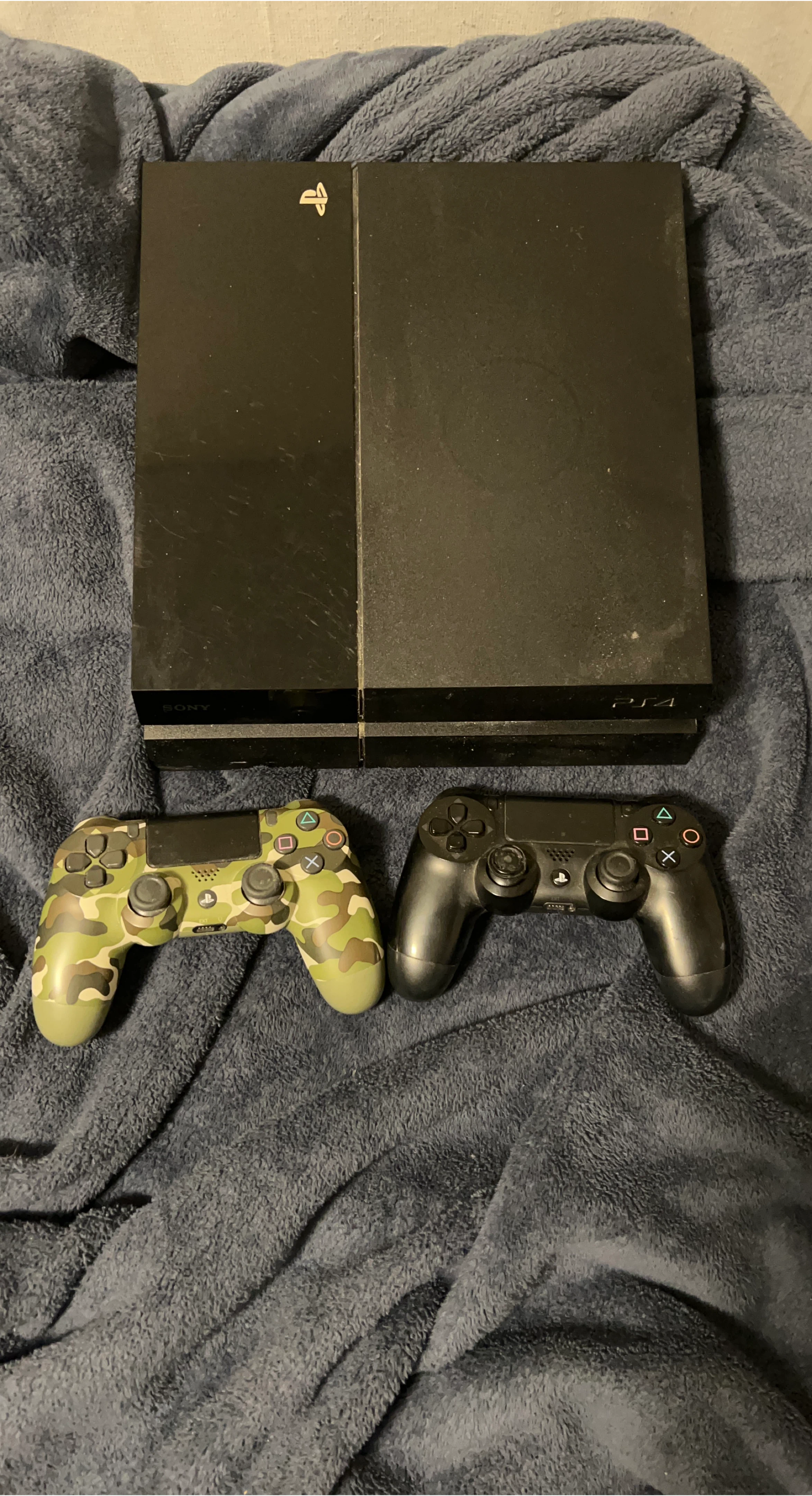 Sony PlayStation 4 Console with 2 Controllers