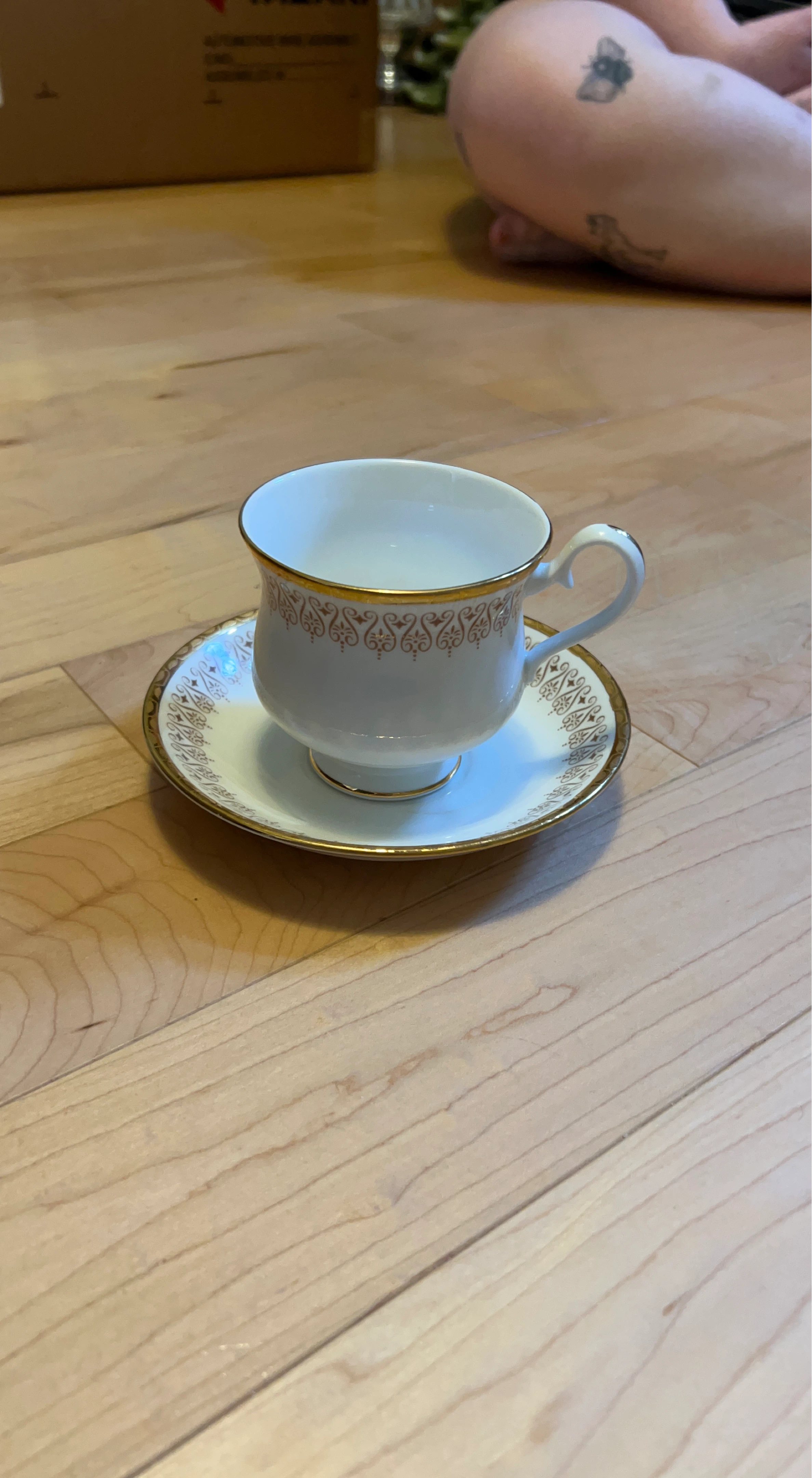 White and Gold Teacup and Saucer Set