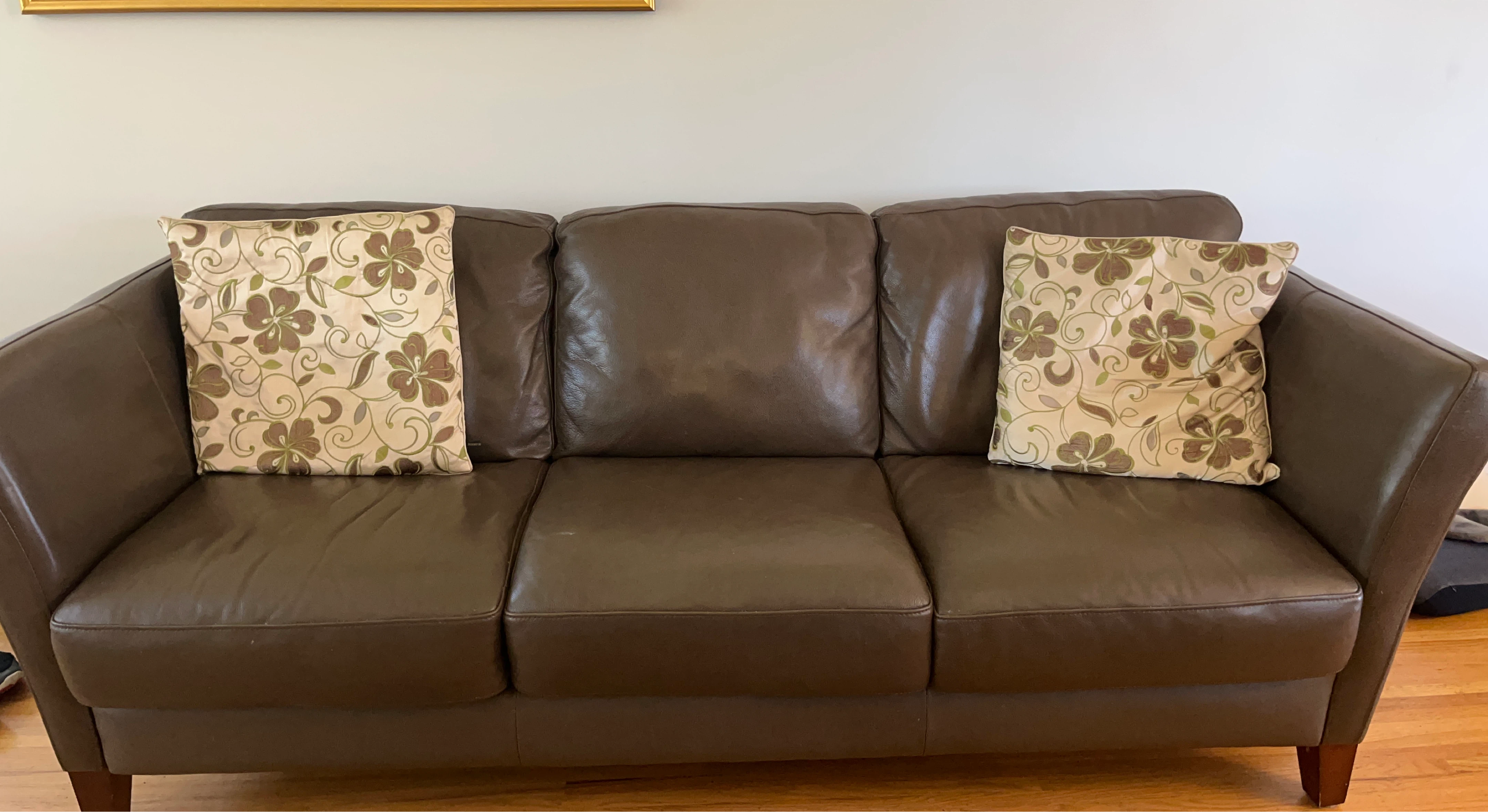 Brown Leather 3-Seater Sofa with Floral Pillows