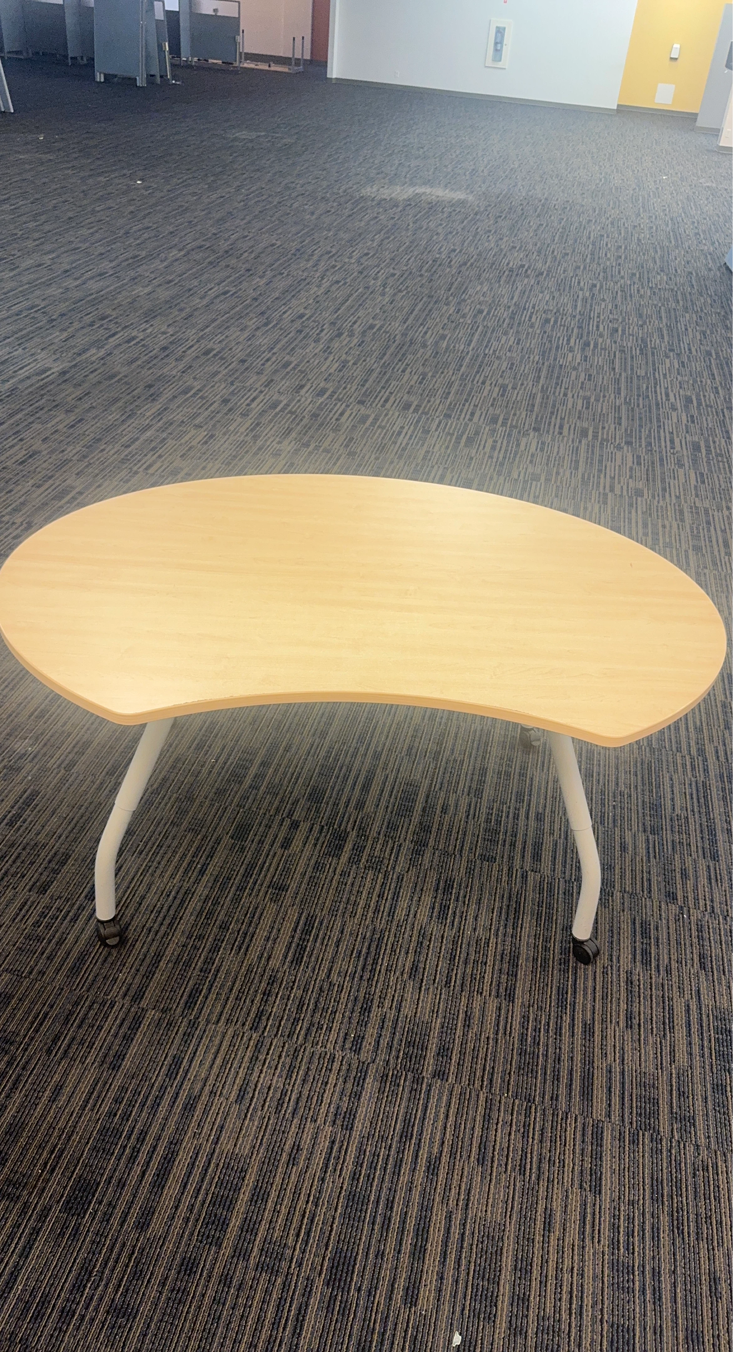 Kidney-shaped rolling desk