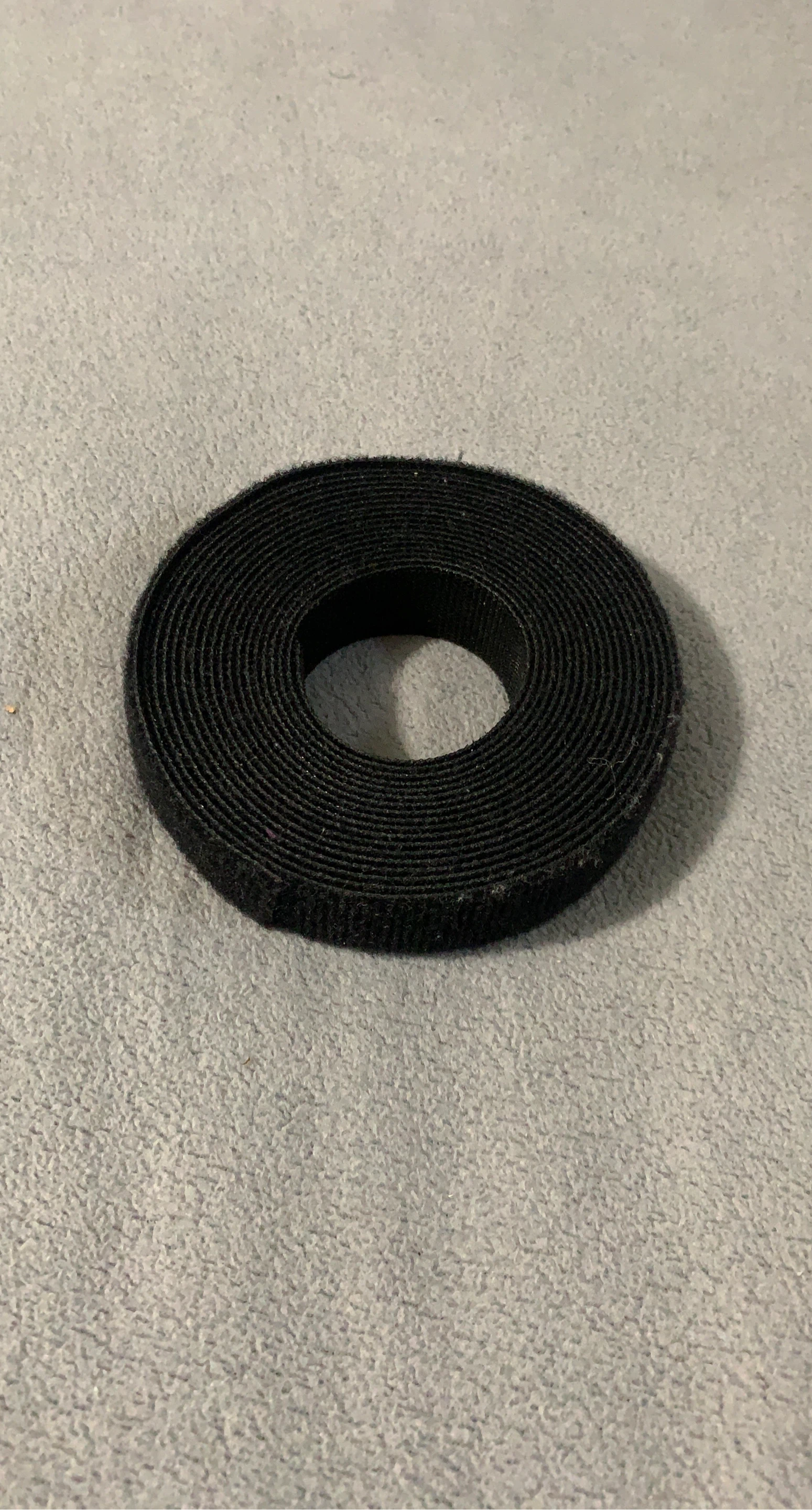 Black roll of Velcro strap