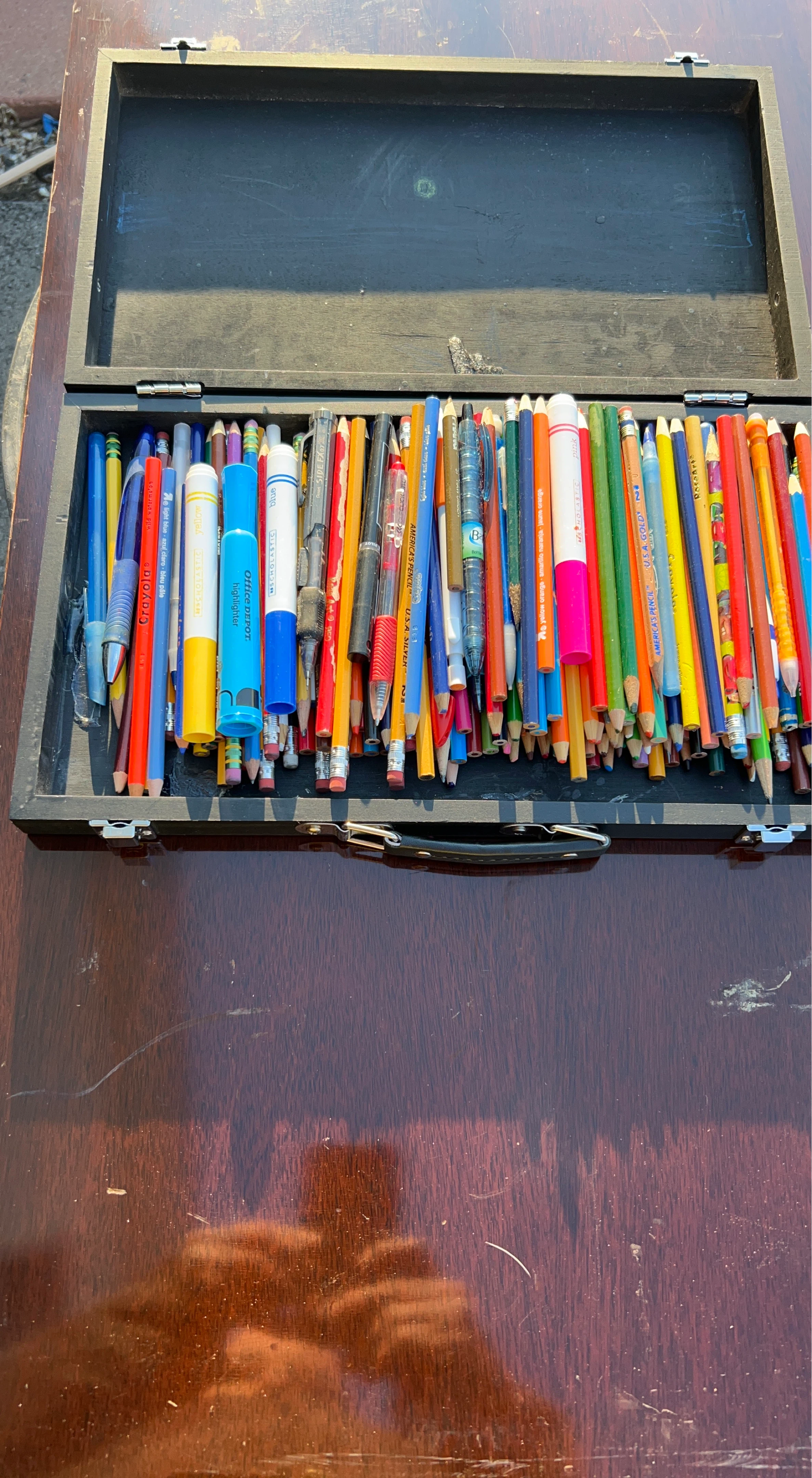Assorted Colored Pencils, Pens, and Highlighters in Wooden Box