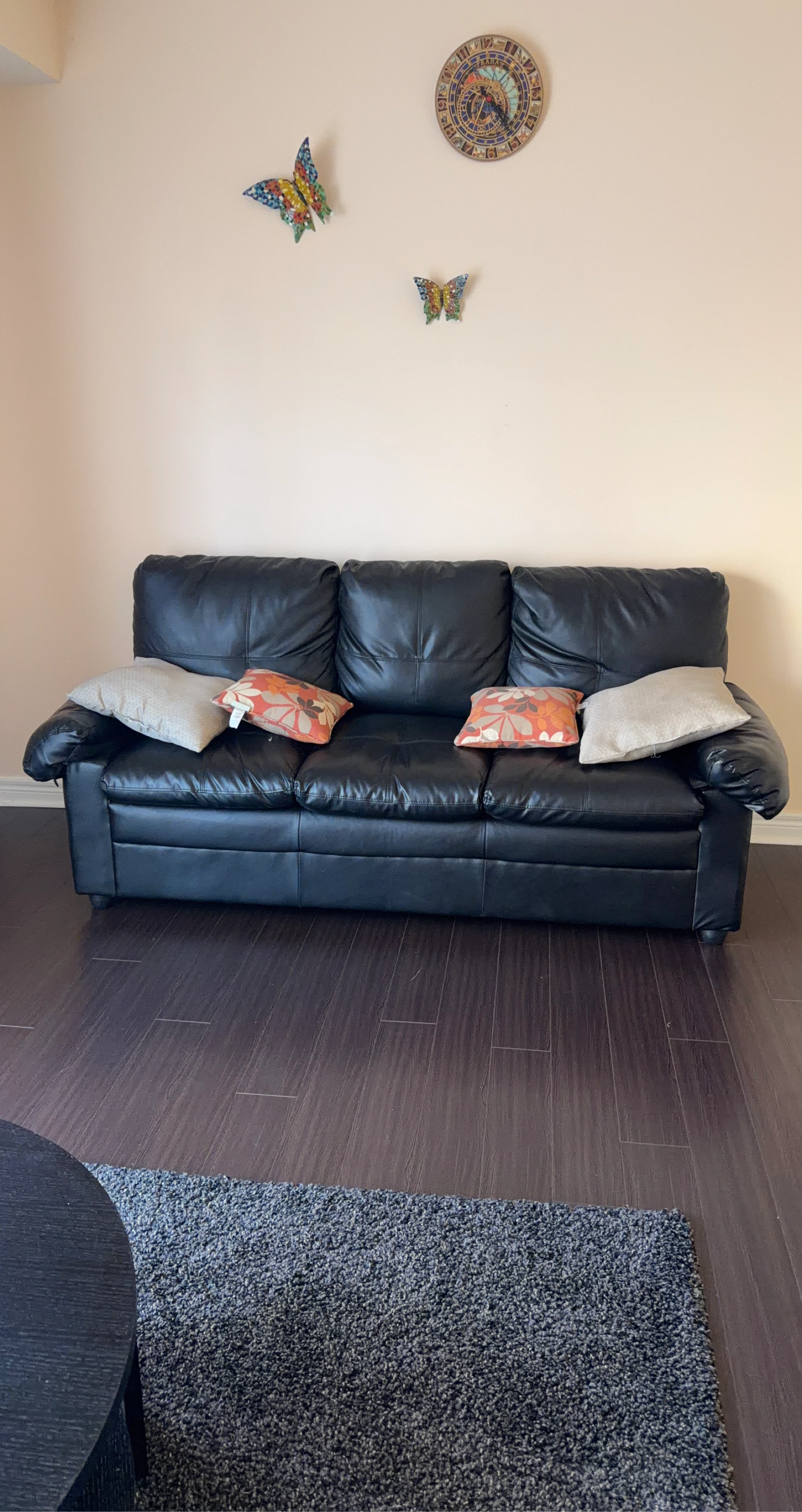 Black faux leather couch