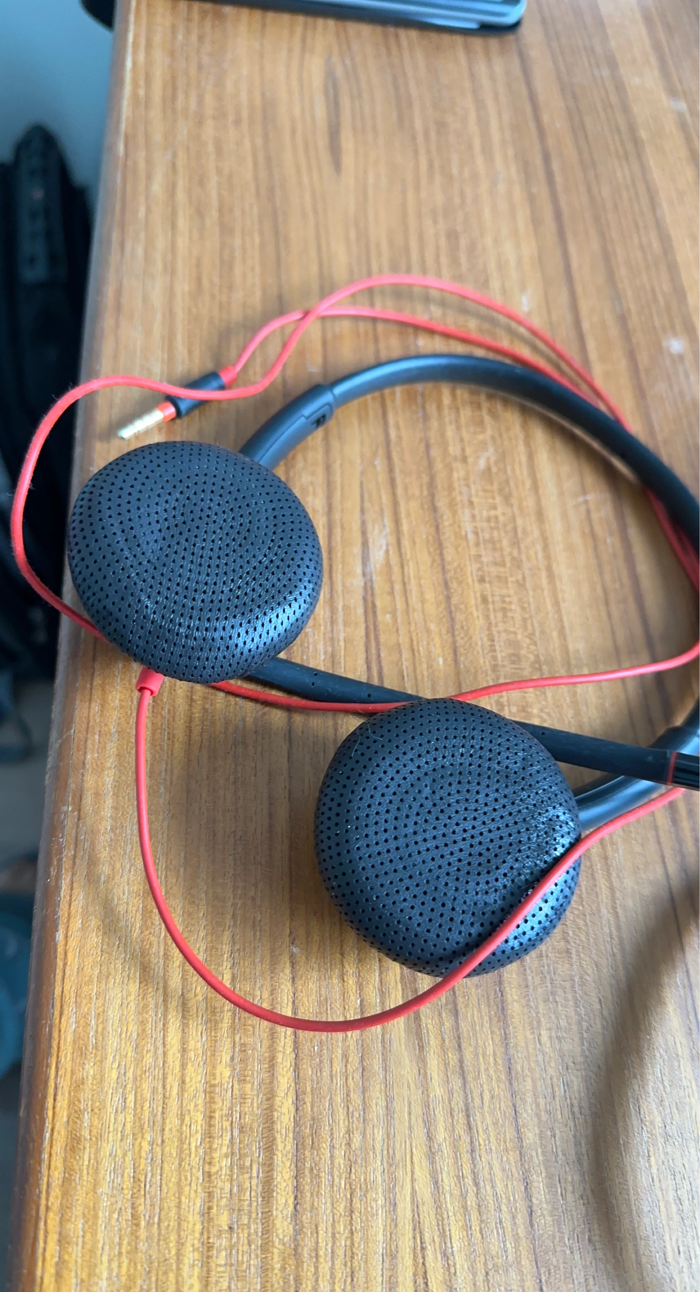 Black On-Ear Headphones with Red Cord