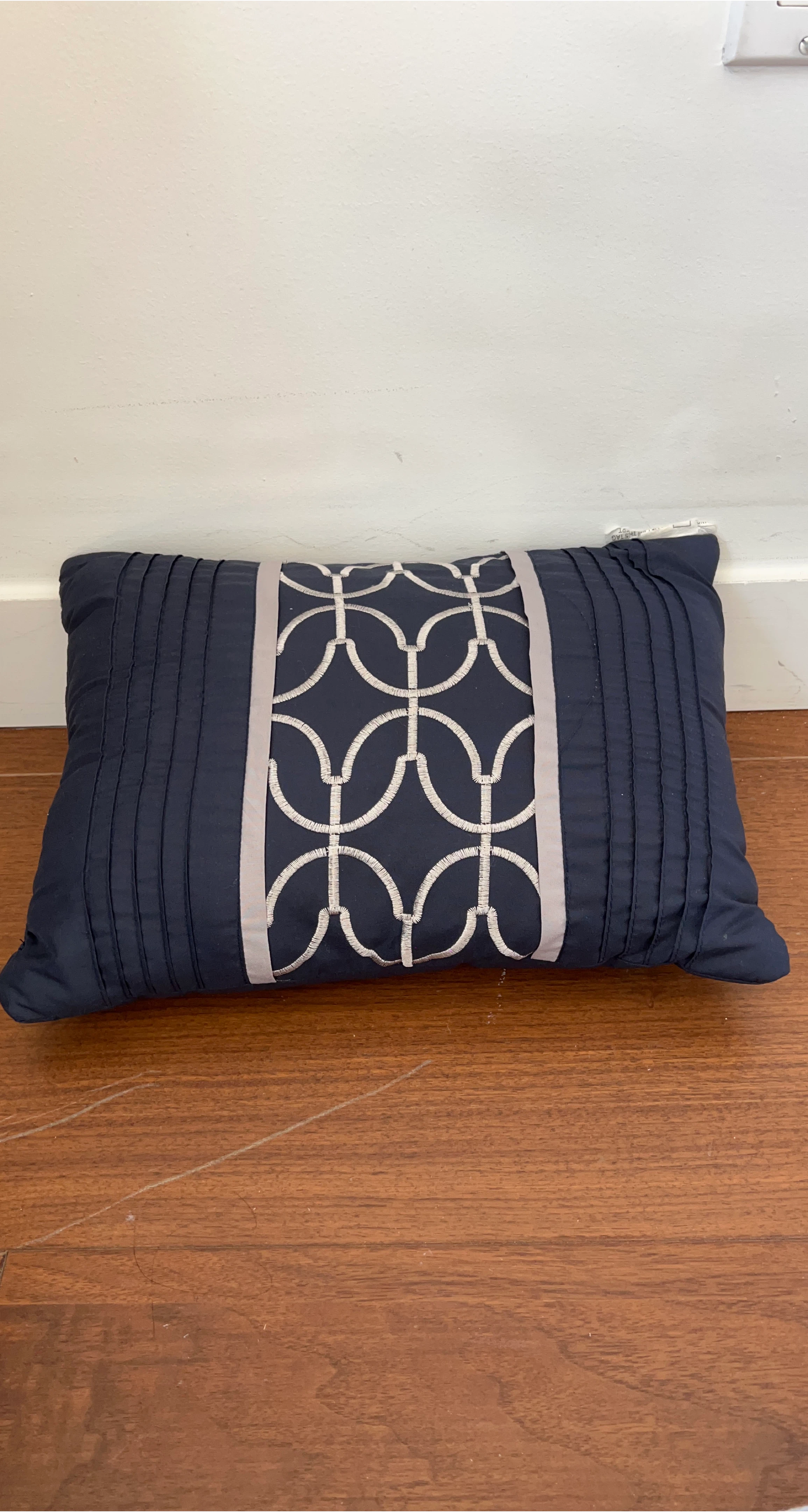 Dark Blue Pleated Accent Pillow with Geometric Design