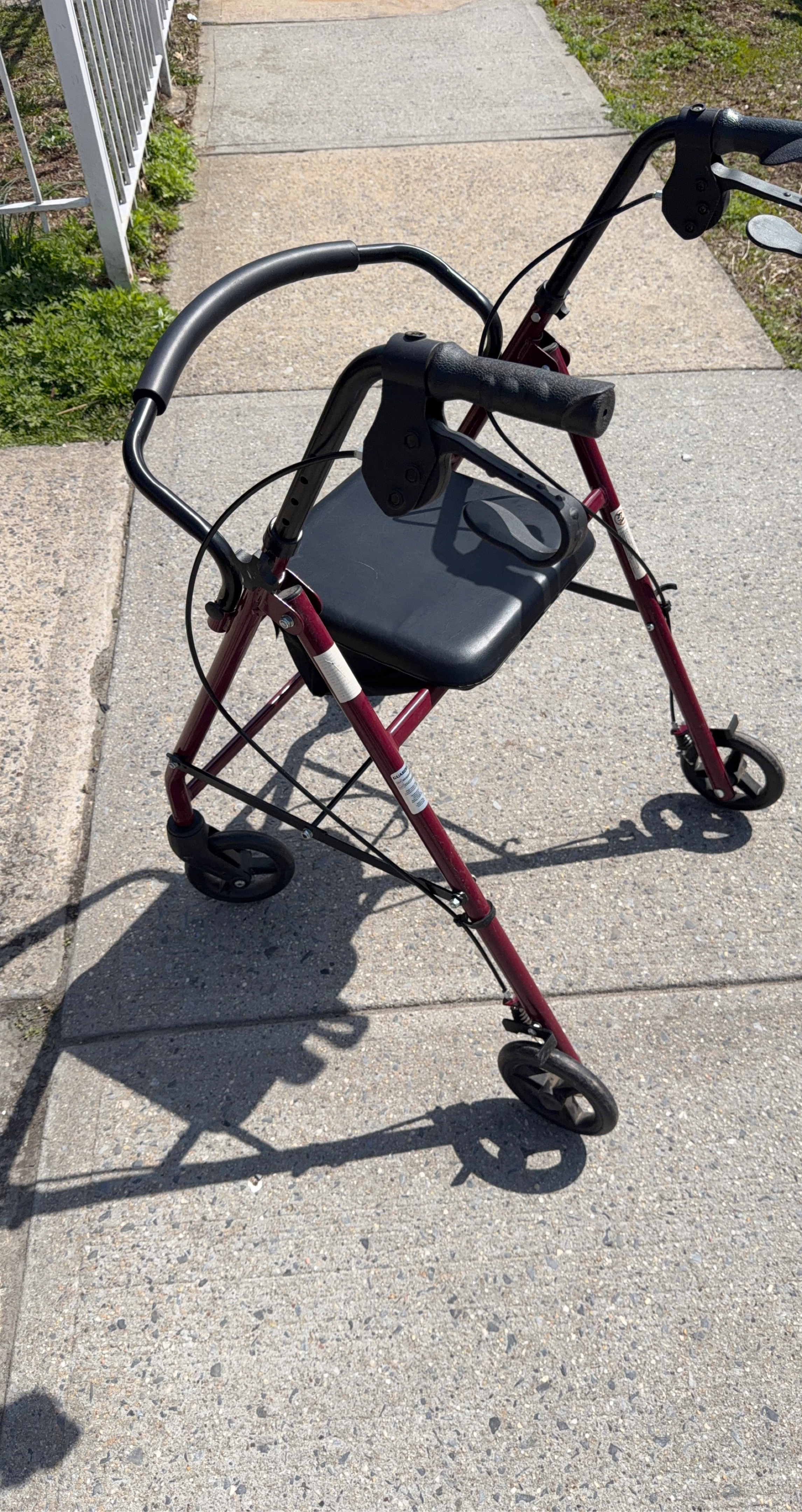 Red Folding Walker with Seat