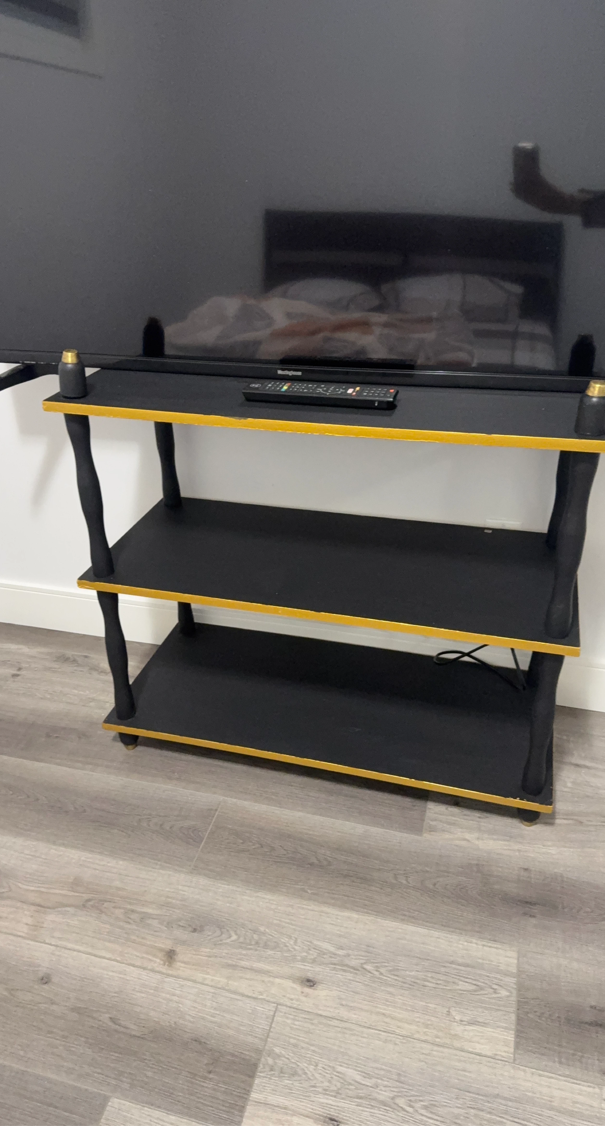 Black 3-Tier TV Stand with Gold Accents