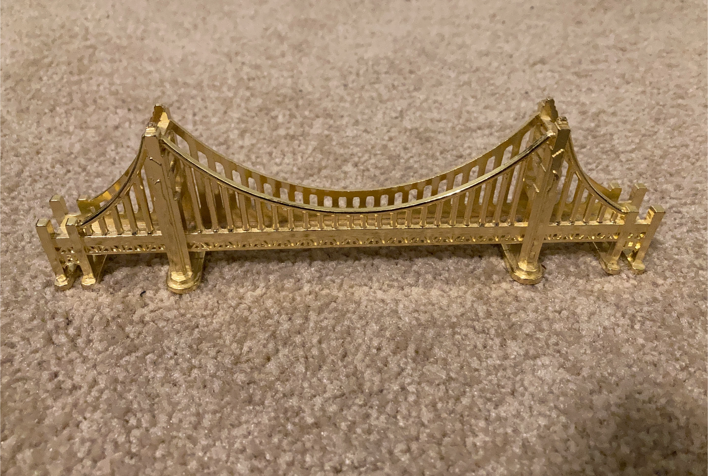 Gold coloured Golden Gate Bridge replica