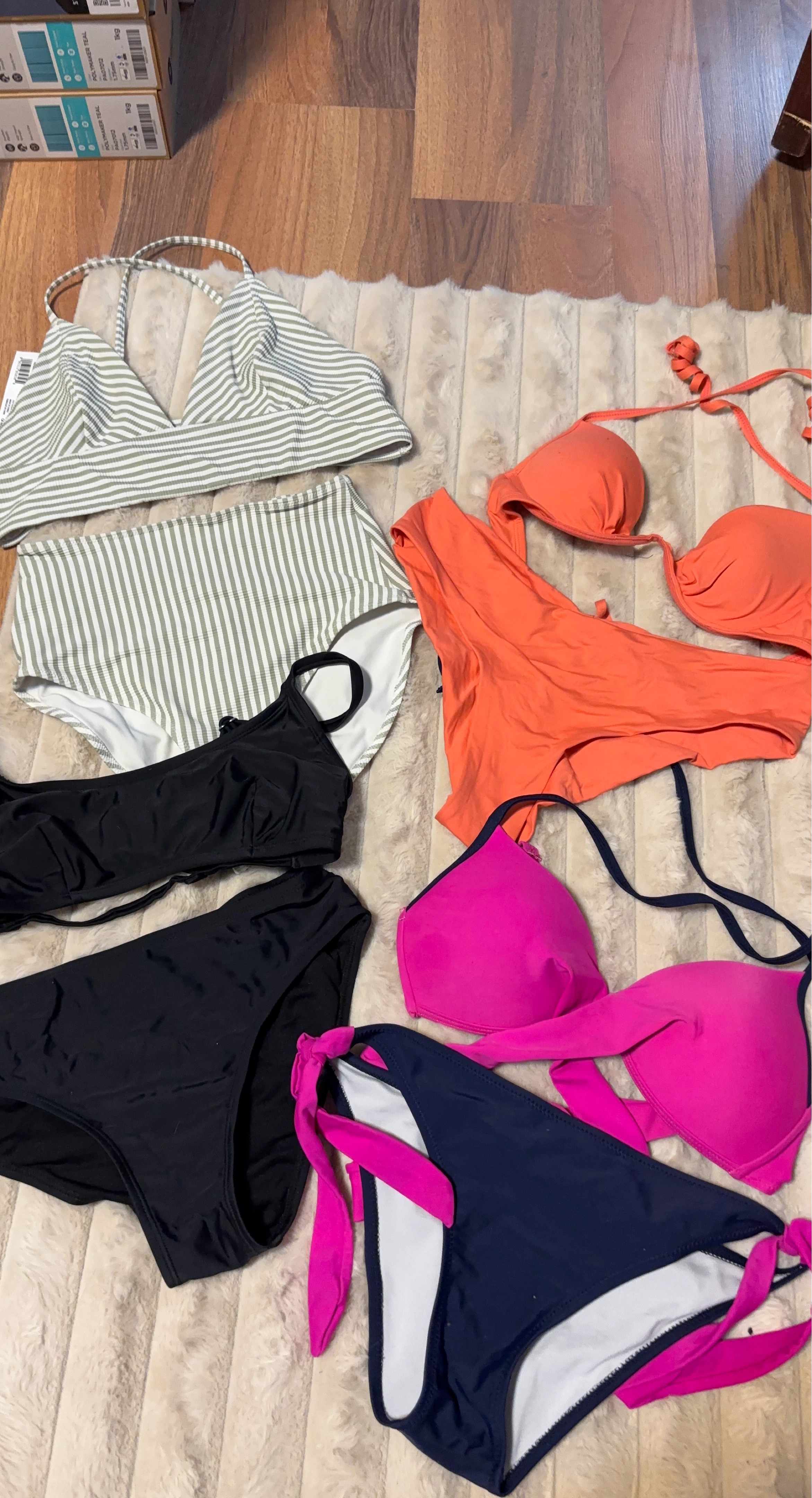 Bundle of women's bikini tops and bottoms
