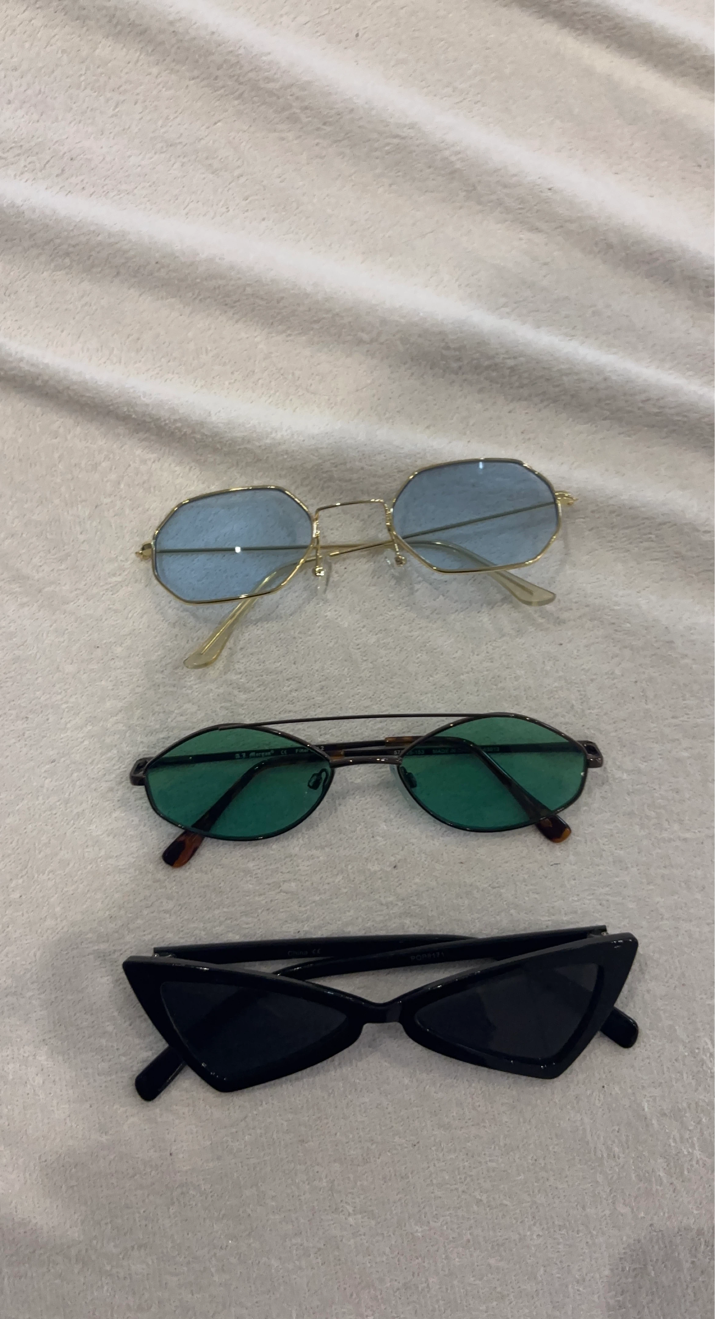 Three Pairs of Sunglasses