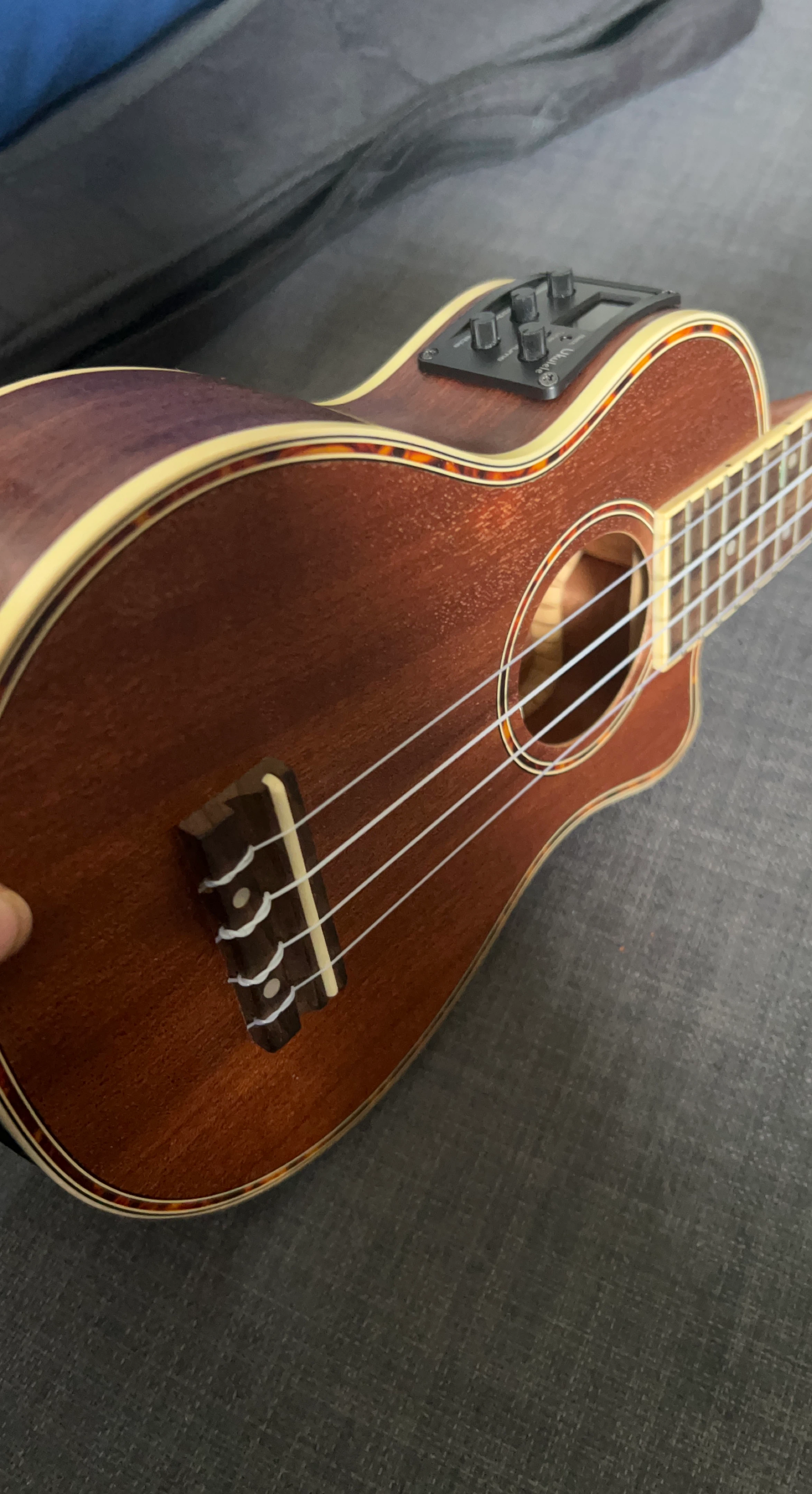 Ukulele with built-in tuner