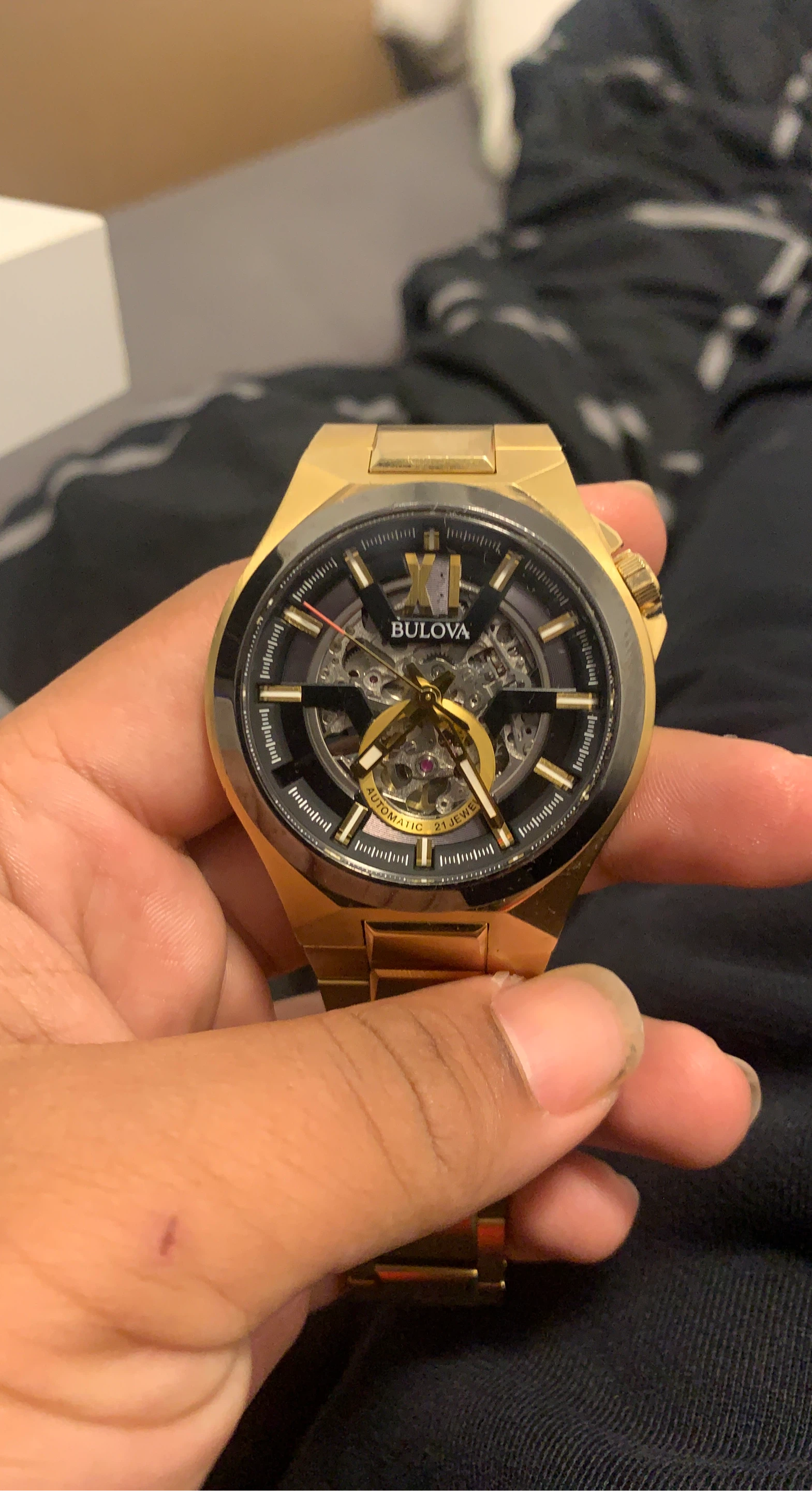 Bulova Automatic Watch (The X fell out of place)