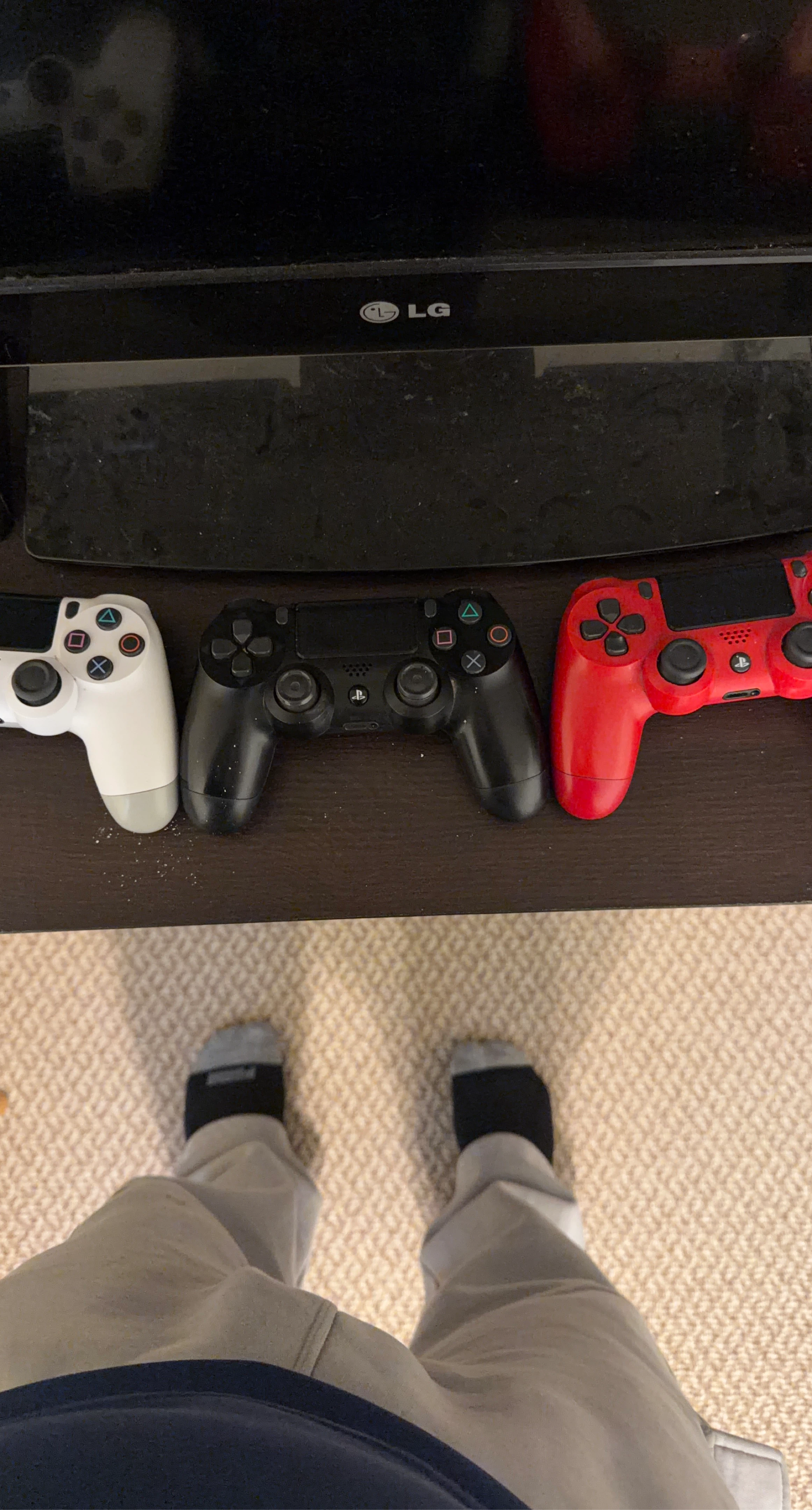 PlayStation 4 DualShock 4 Controllers (White, Black, Red)