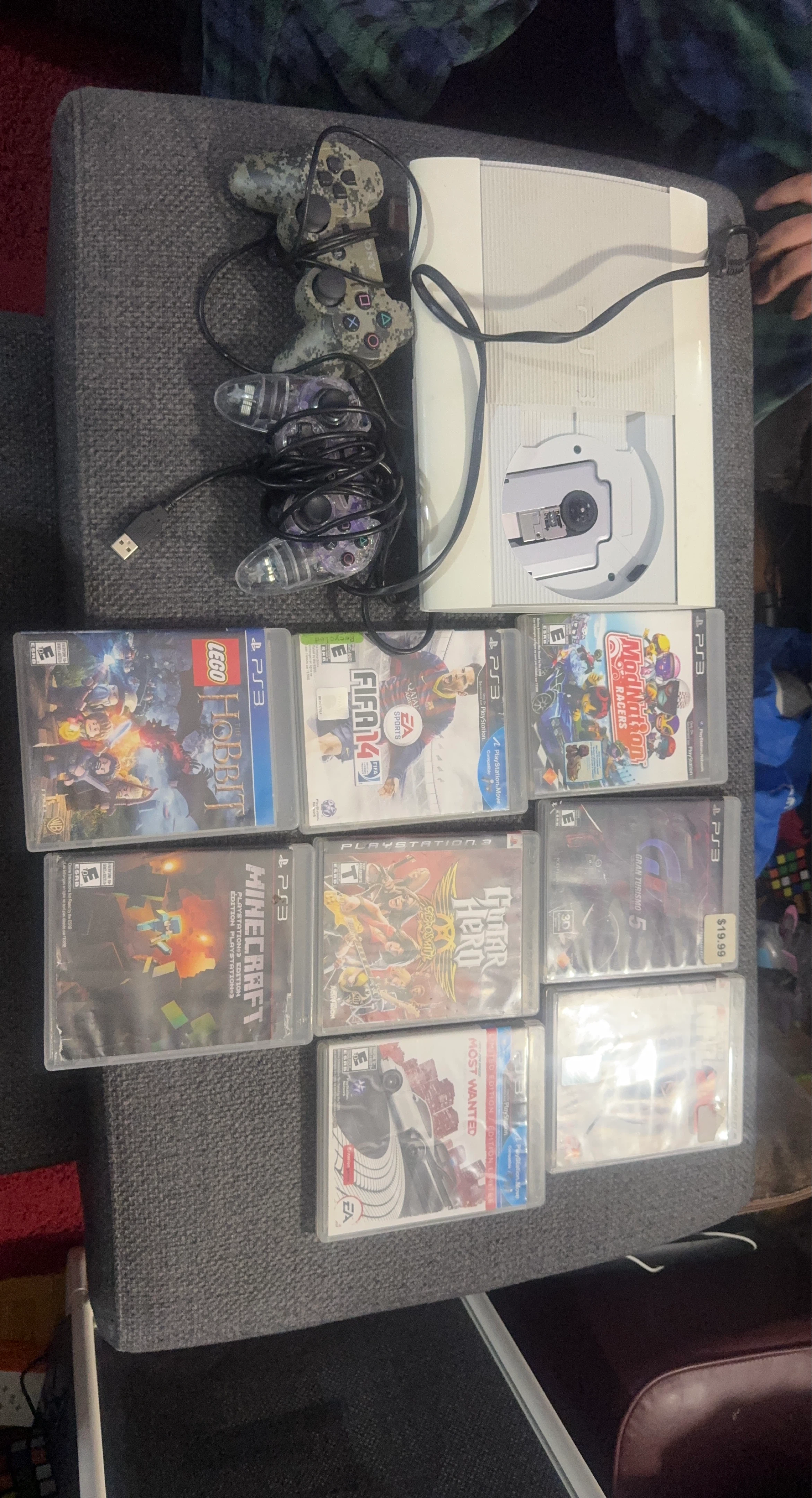 Sony PlayStation 3 Console with 7 Games & 2 Controllers