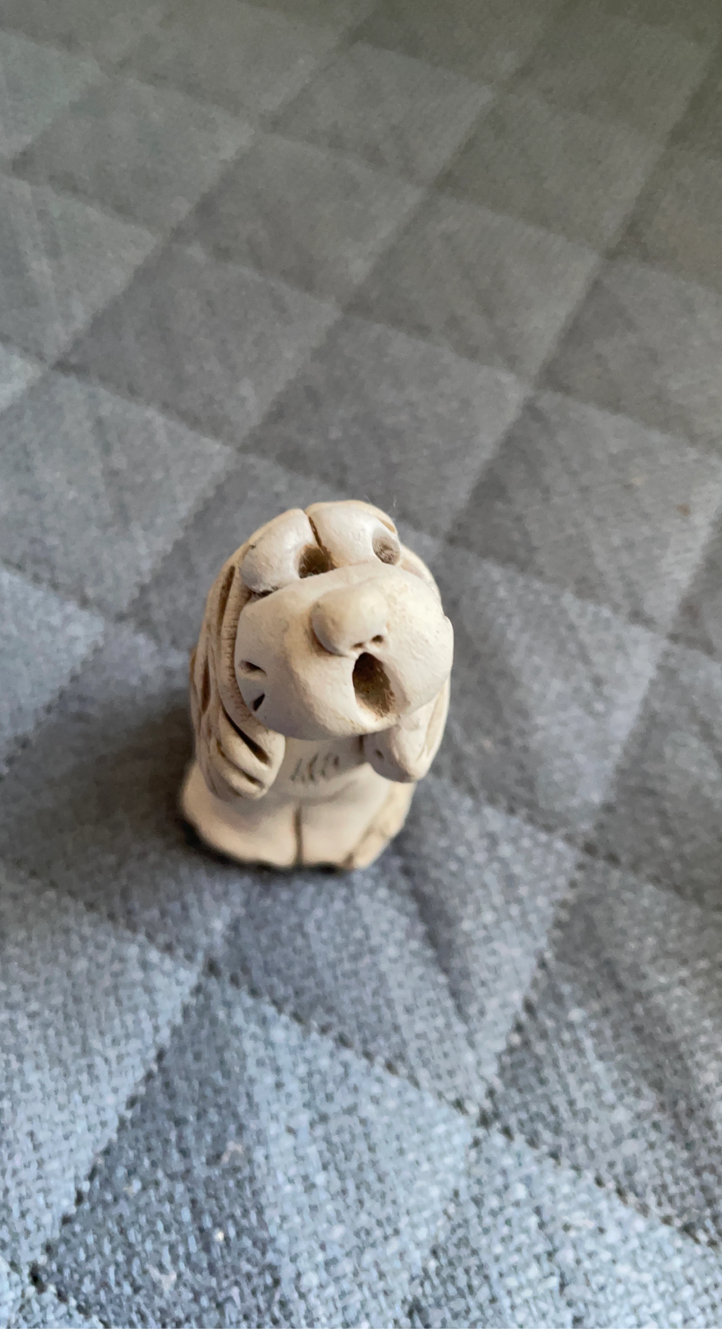 Miniature Dog Figurine