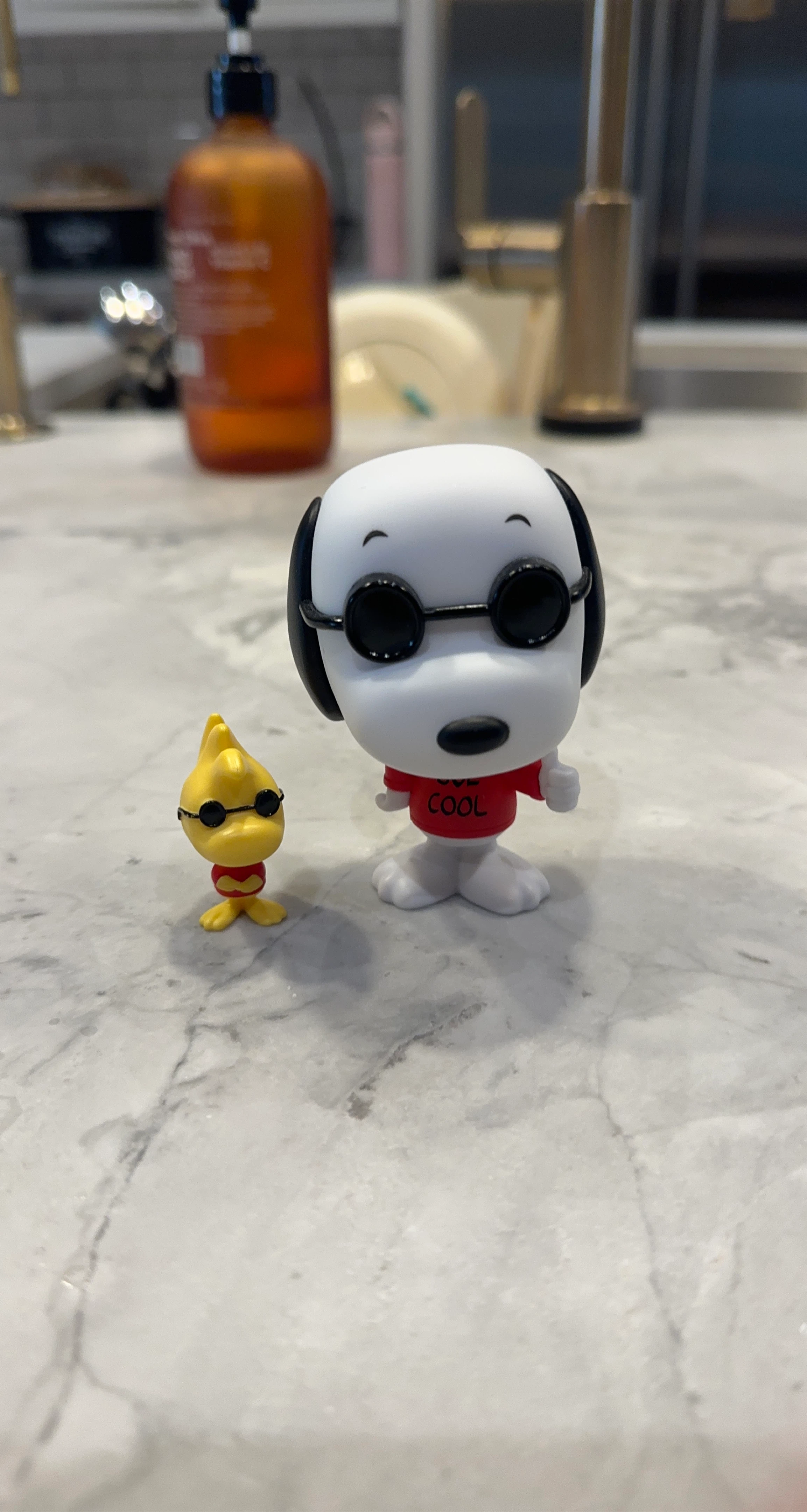 Funko Pop! Snoopy with Woodstock wearing sunglasses