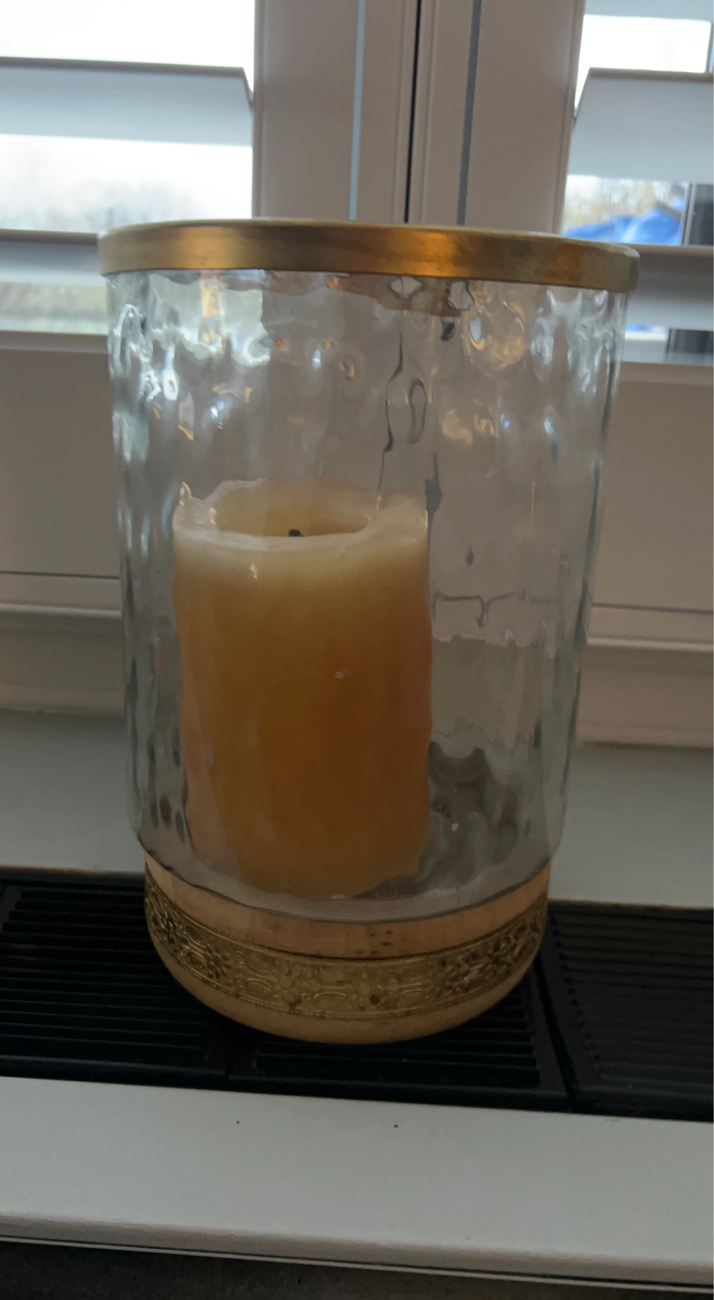 Glass hurricane candle holder with gold trim