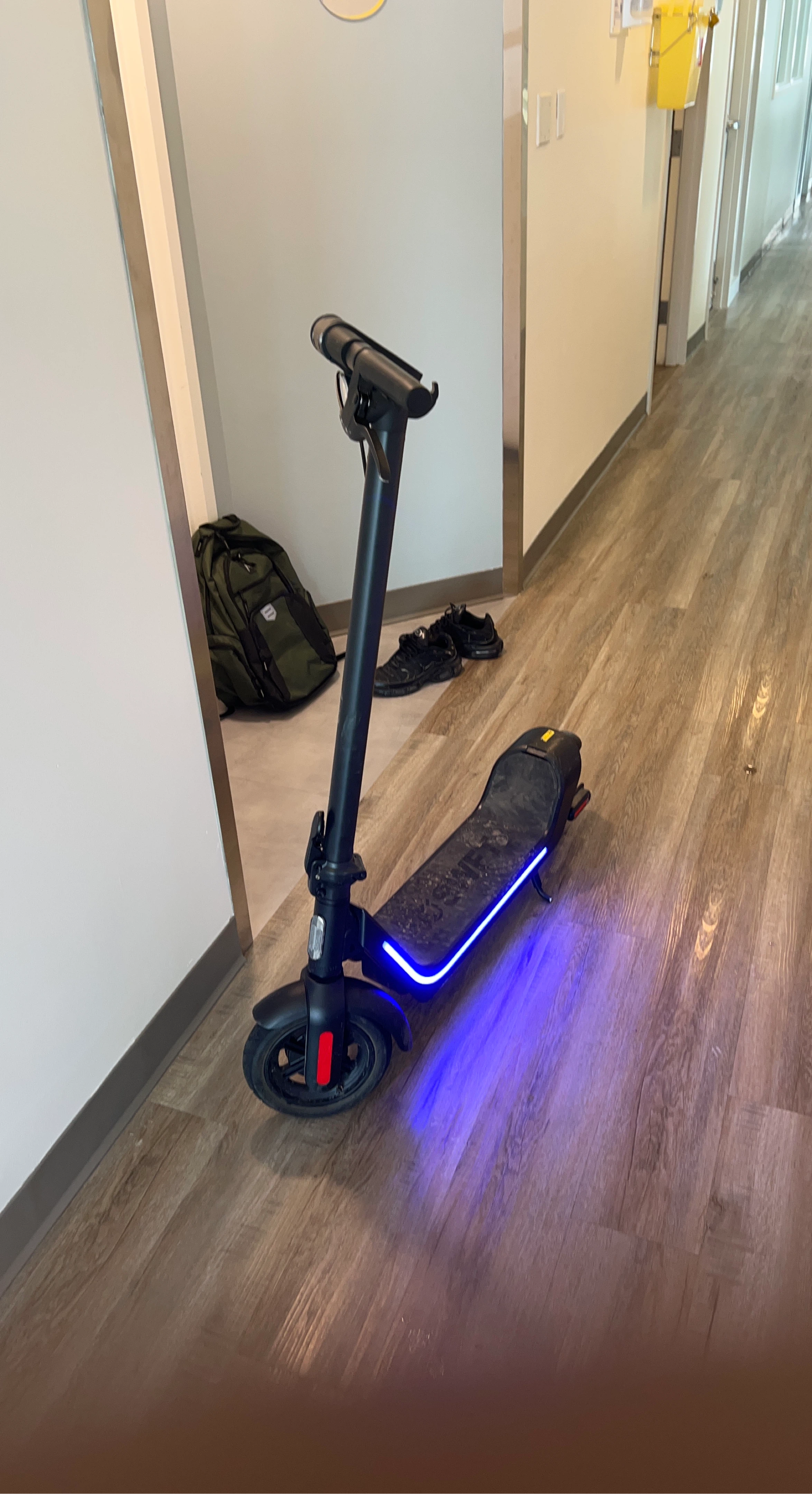 Black Electric Scooter with Blue LED Lights