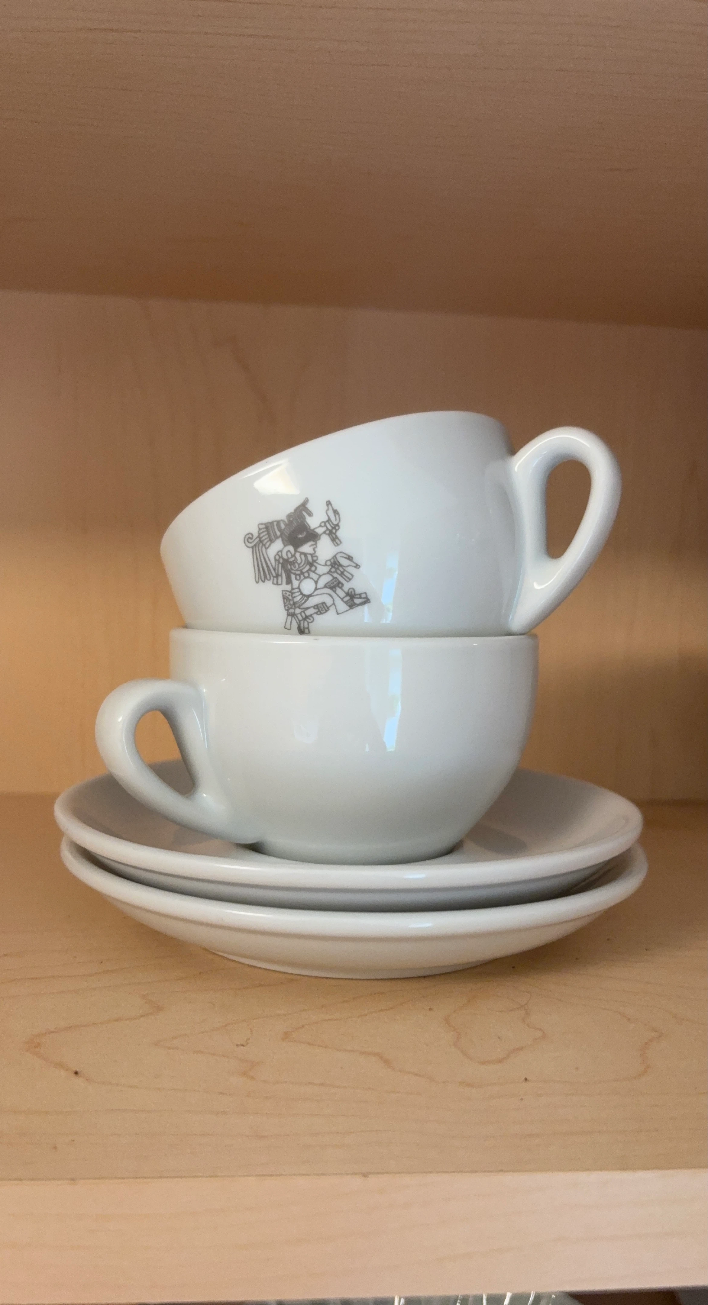 2 White Ceramic Demitasse Cups and Saucers with Aztec Design