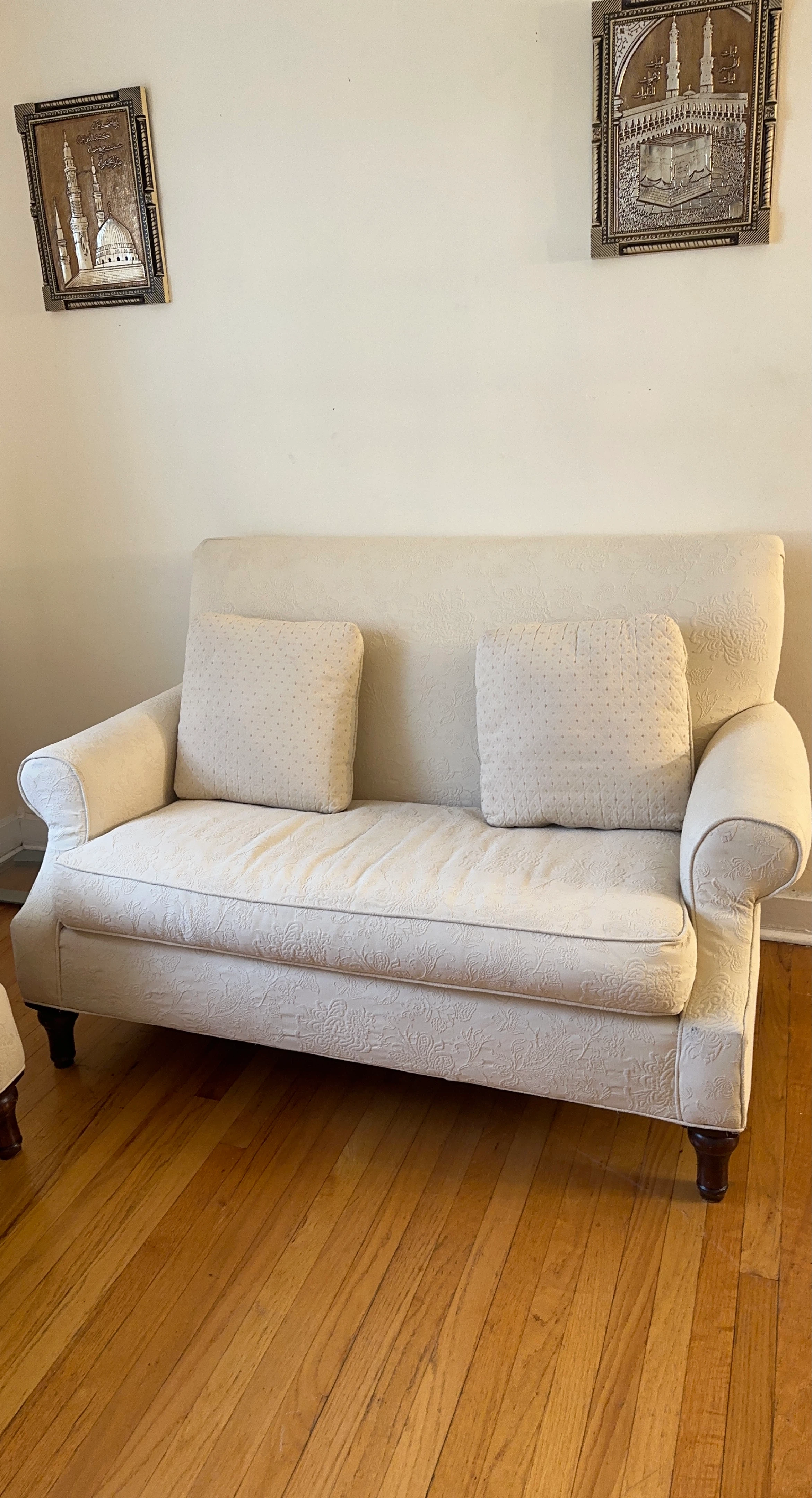 Cream Upholstered Loveseat with Floral Pattern