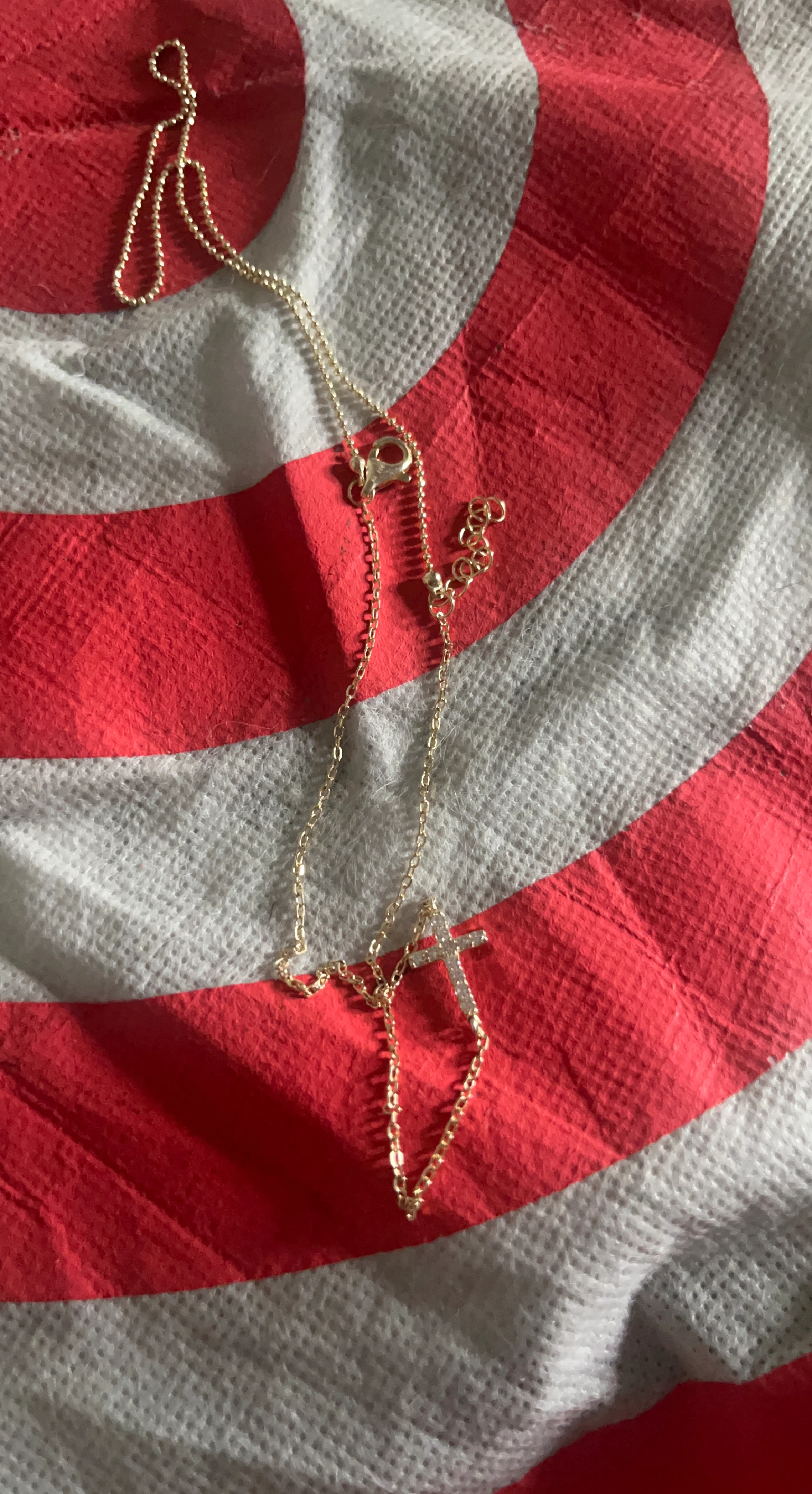 Gold tone cross necklace
