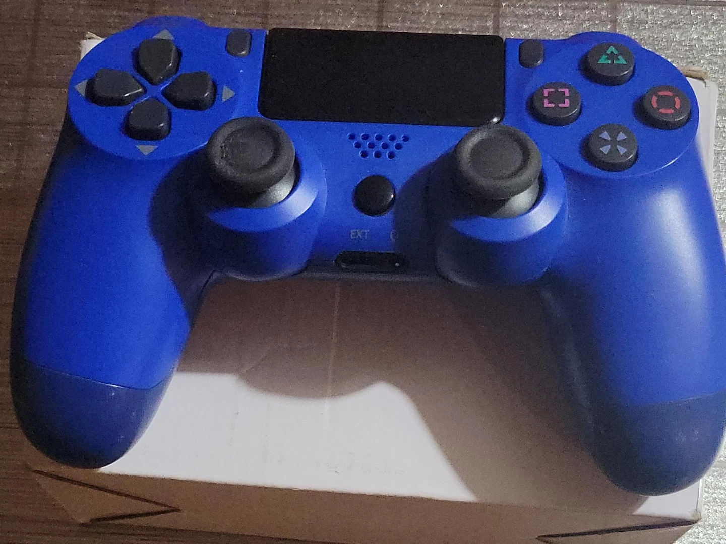 Blue wireless controller for PS4 and PC